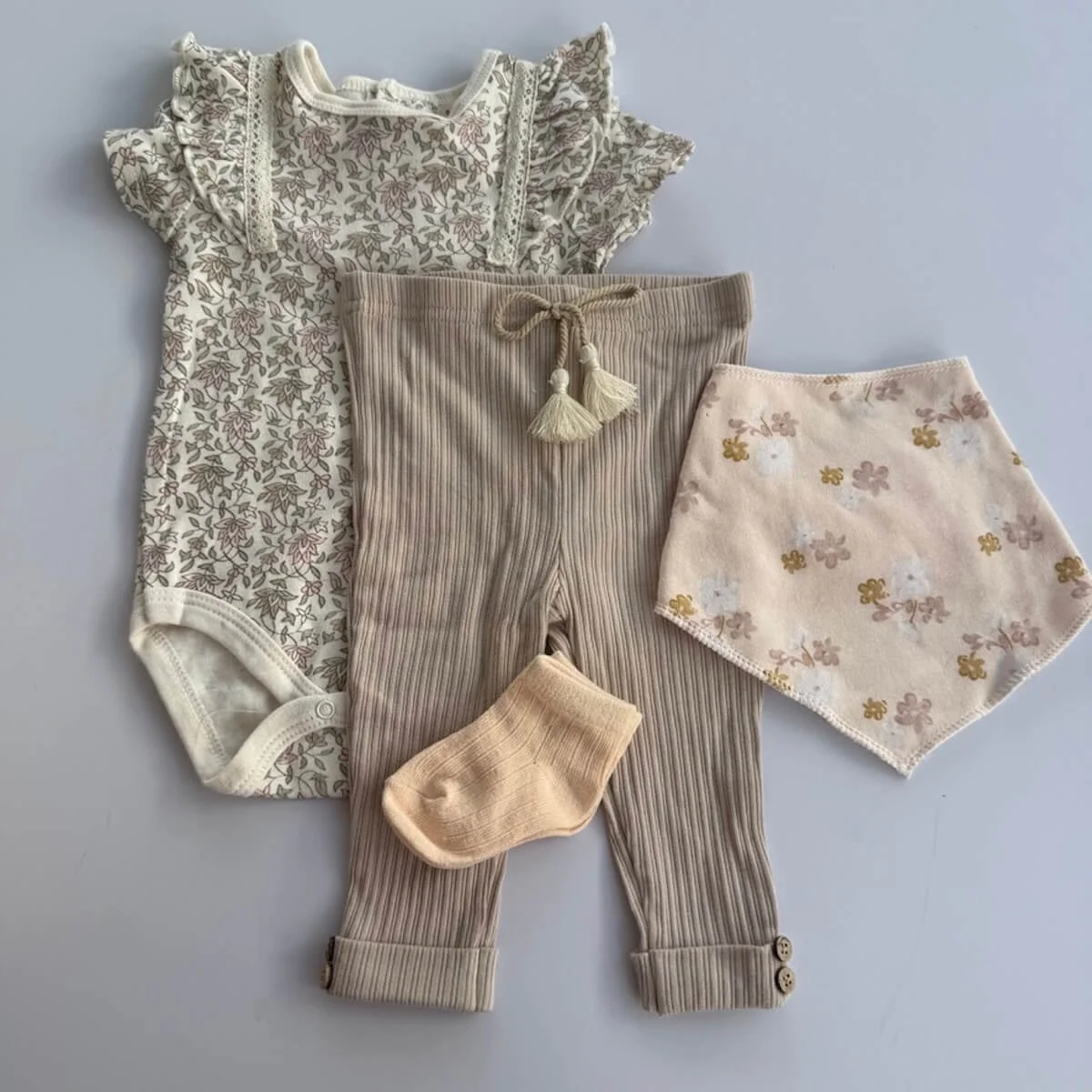 Clothing inlcuded in the sweet Beginnings baby hamper for delivery on the Gold Coast same-day.