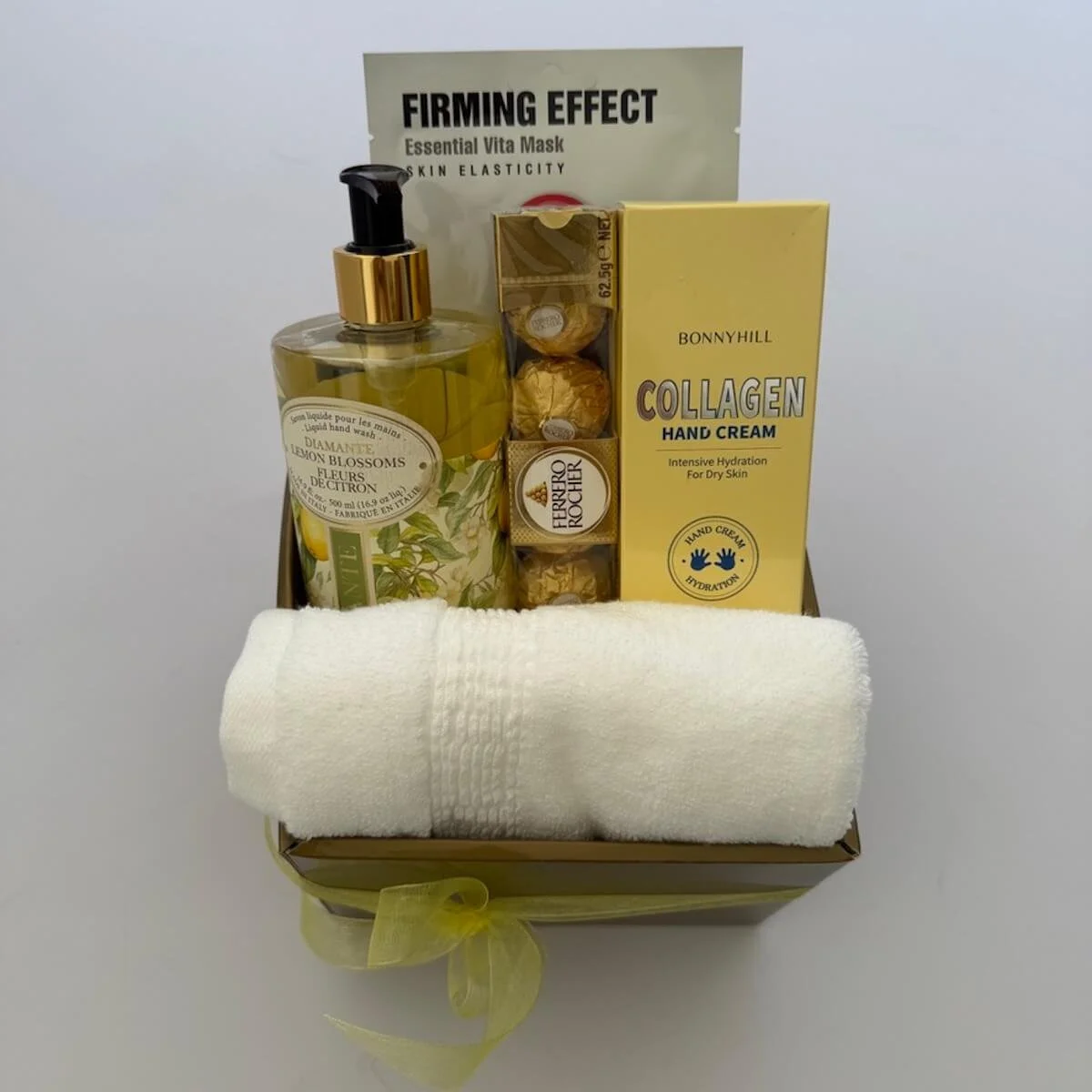 Pamper gift box with La Florentina citrus hand wash, Serene Sunday's hand cream, face mask, cotton cloth, Ferrero Rocher chocolates and gift box