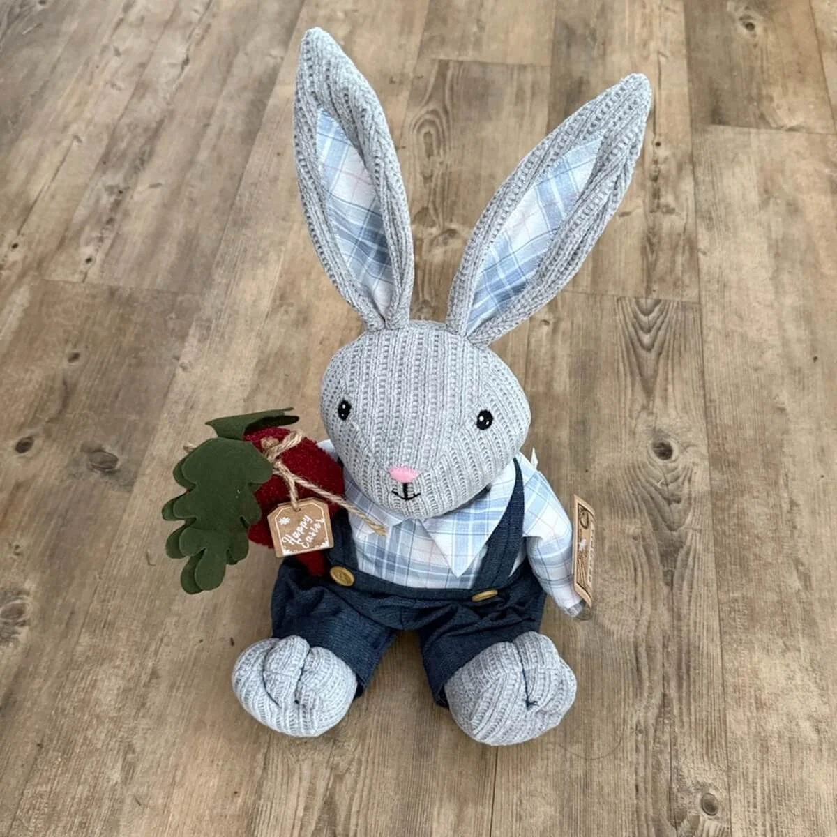 Blue Bunny Easter Gift, grey stitched plush bunny with blue pants, checkered shirt, pink nose, holding red carrot, weighted to sit, 35cm