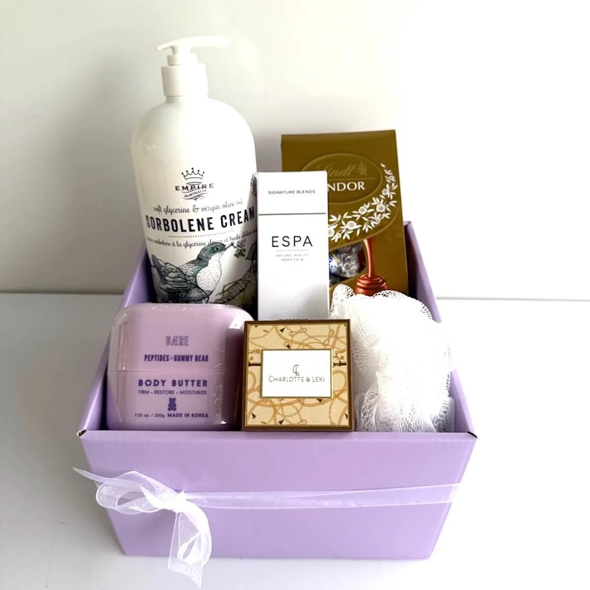 Body & Soul Ladies Gift Hamper featuring ESPA body oil, body butter, chocolates and earrings with same-day Gold Coast delivery.