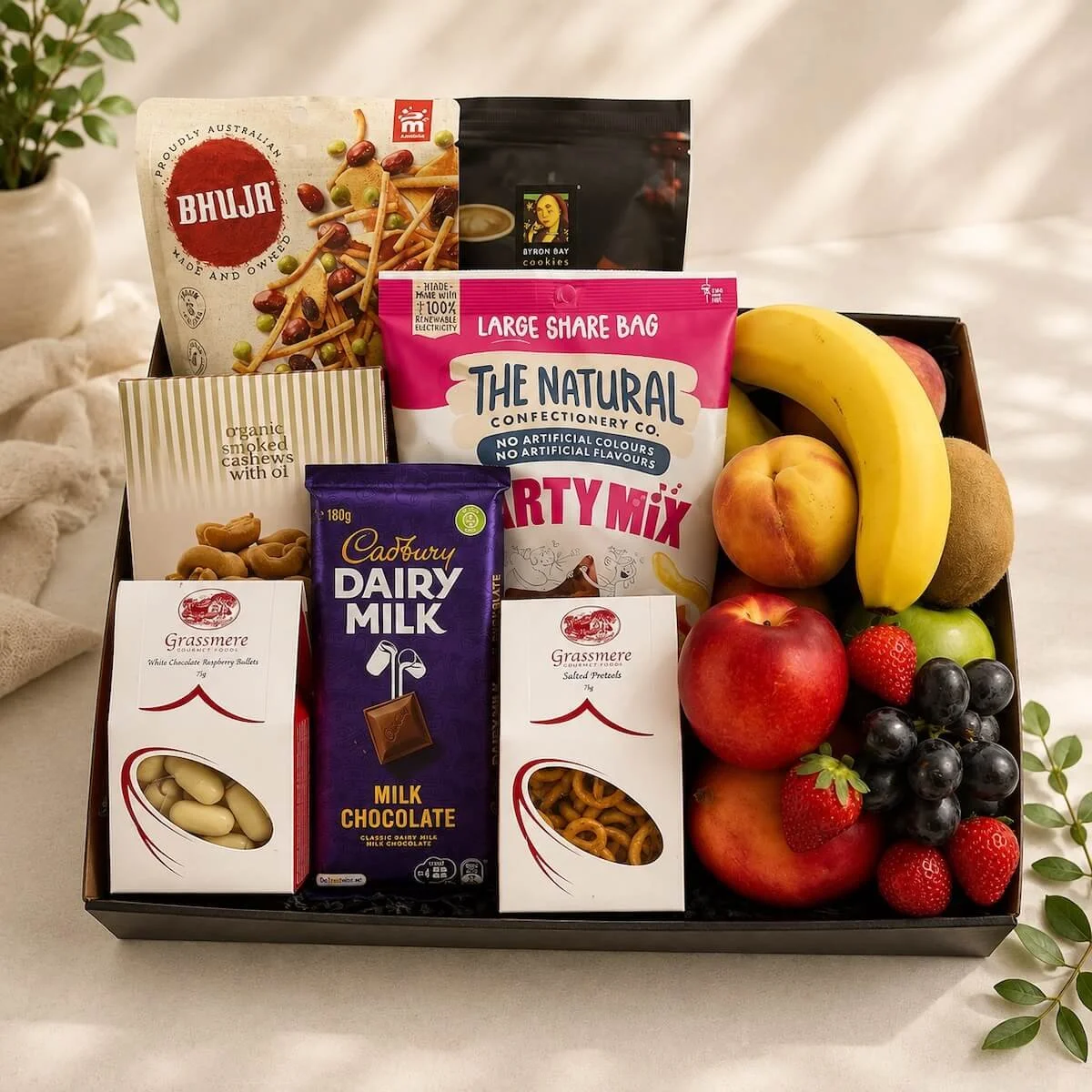 he Fresh & Fabulous gift hamper has a selection of fresh seasonal fruit, Chocolates, Cookies, lollies, Bhuja and gourmet treats.
