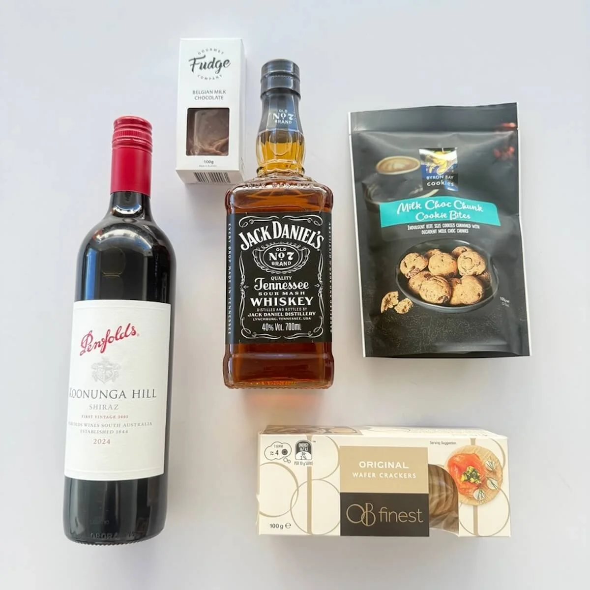 A bottle of wine and spirits, crackers and cookies and chocolate fudge which are all on the extras page and can be added to gifts.