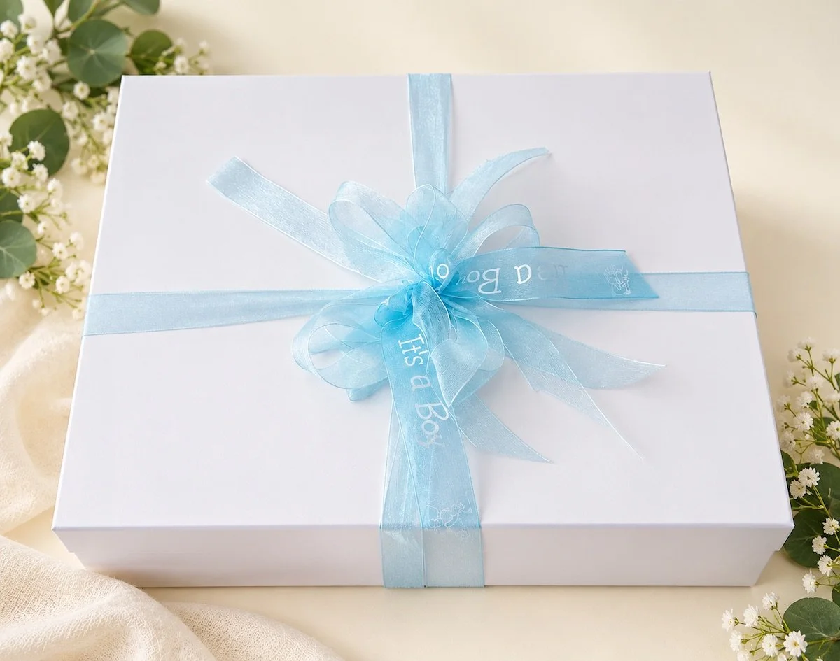 Sweet Dreams Baby Gift Box beautifully presented in a white magnetic gift box tied with blue ribbon, ready for gifting on the Gold Coast.