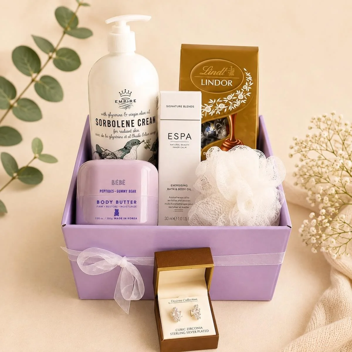 Lindt chocolates and cubic zirconia earrings in a luxury gift box.