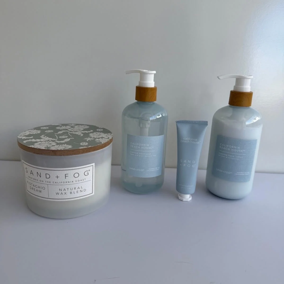 The Califiornia Beach House Sand & Fog hand lotion, hand wash & Hand Cream with a Sand & Fog candle.