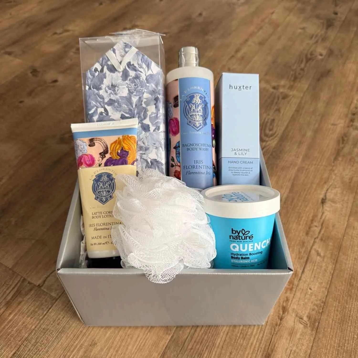 Pamper gift hamper has La Florentina body Wash & Lotion from Italy, Jasmine and Lily hand cream, Body Balm, scented sachets.