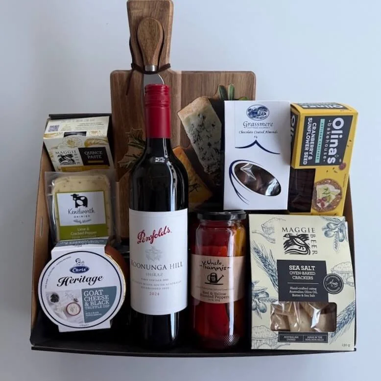 Gift hamper with a cheese board & Knife, cheese, crackers, ceip, fruit paste, chocolate almonds, dip, 700 ml wine deliver Gold Coast.