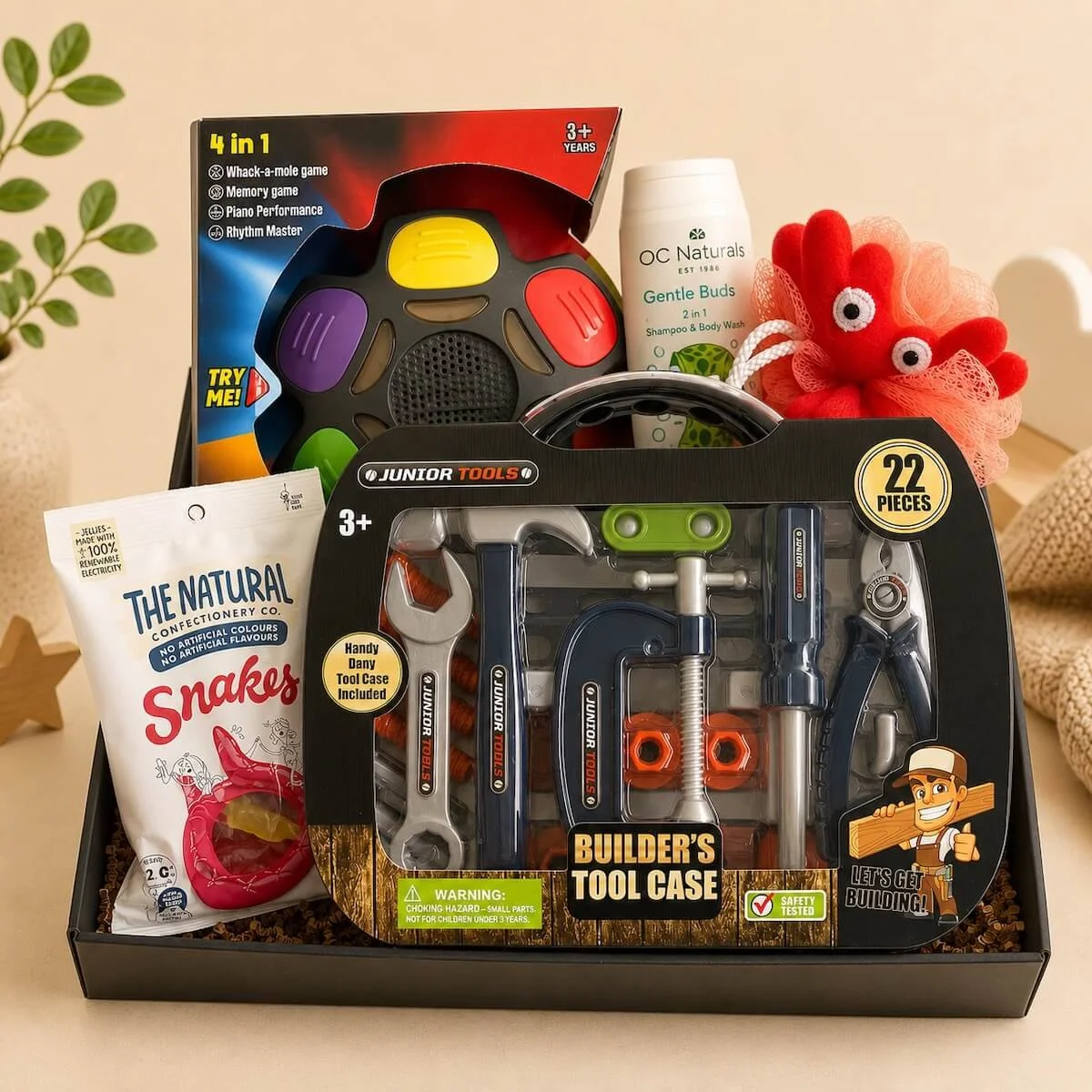 Builder Play Gift Hamper with 22-piece tool caddy, 4-in-1 game, bubble bath and snake lollies
