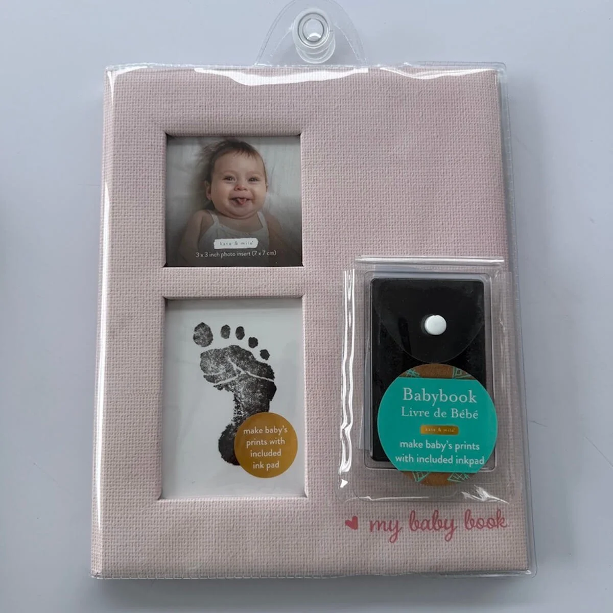 Baby book to record all those milestones, Also includes a stamp pag for foot prints.
