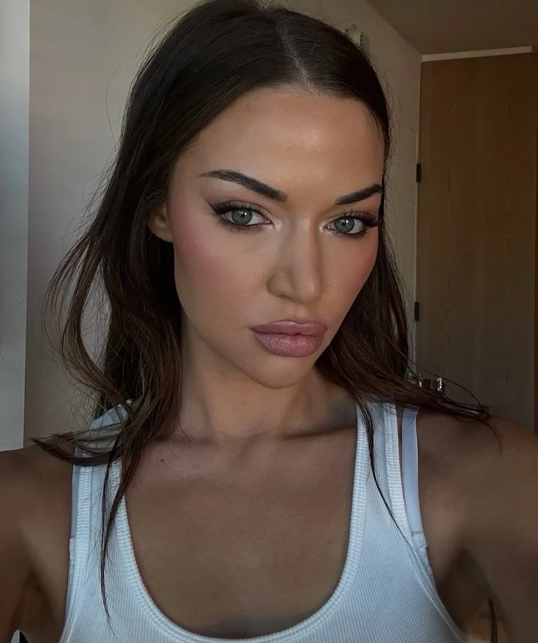 ERIKA COSTELL - AUS AGENT