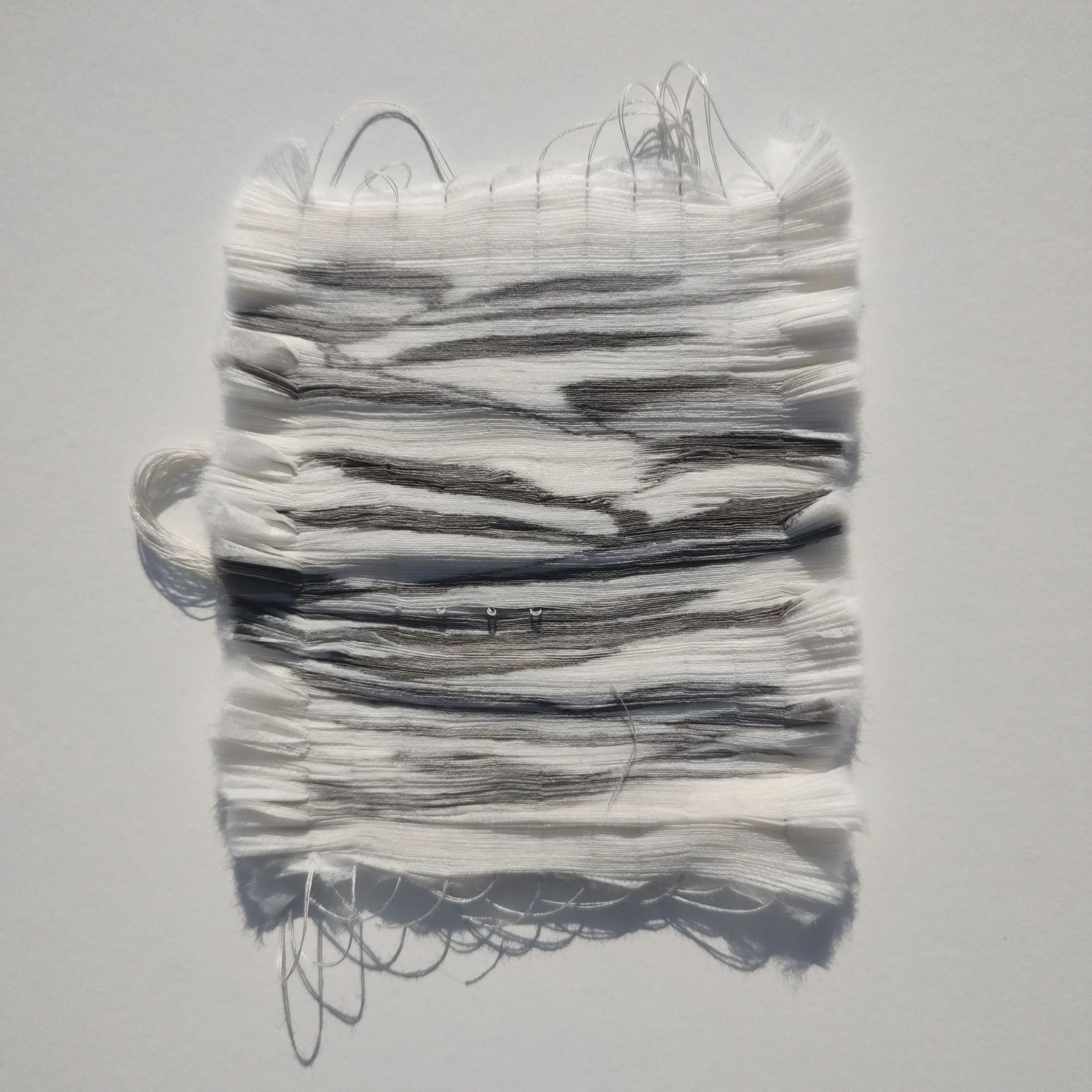 Carole Bury. 'Twisting' pleated ink drawing - framed 25 x 25cm.
RHS Chelsea - PURE FINE ART - stand RHW248