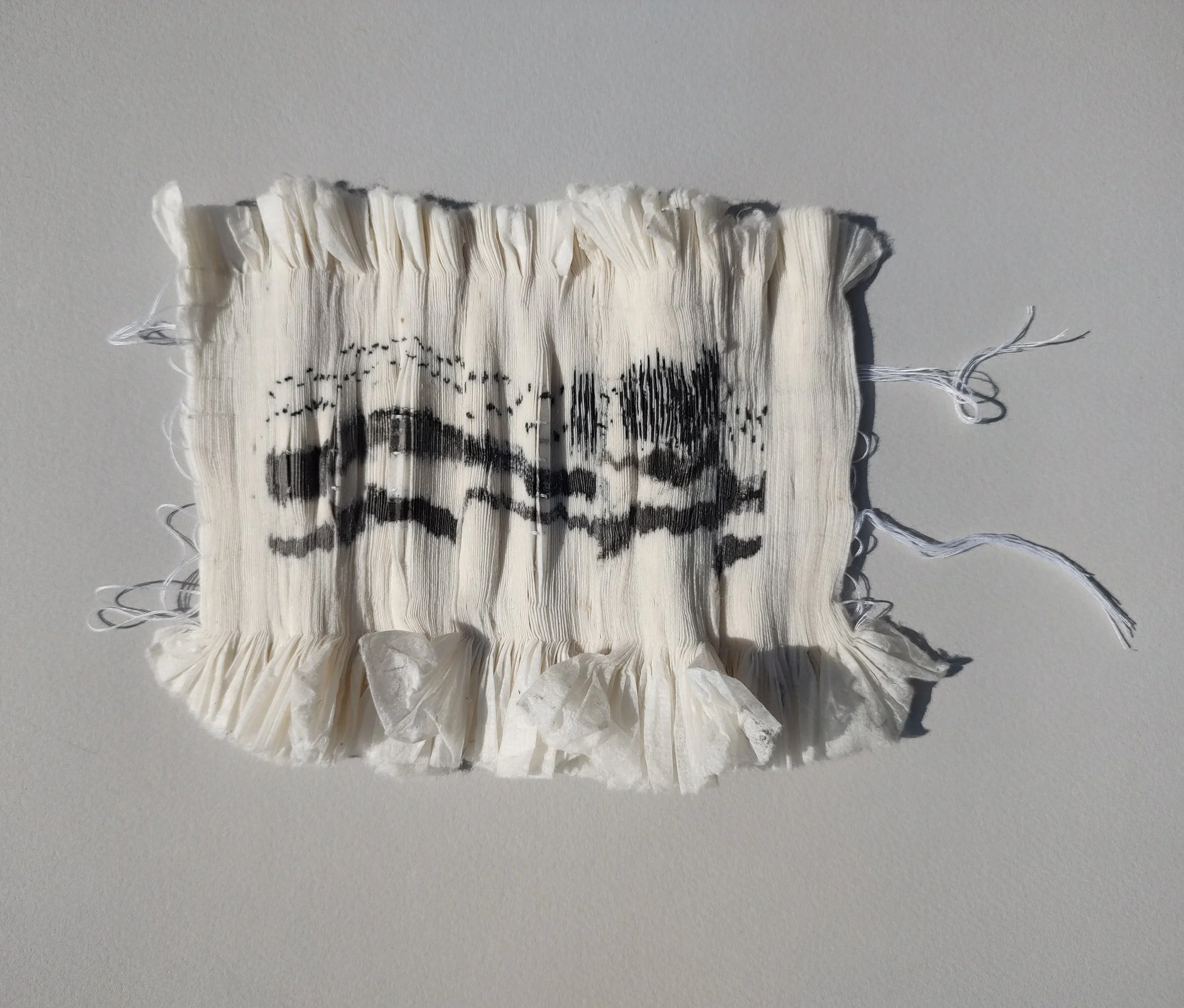 Carole Bury. Pathway.  
Pleated Paper Ink Drawing 
Hand stitch mounted to paper 24 x 24cm
£100.00 plus P&P. contact by email