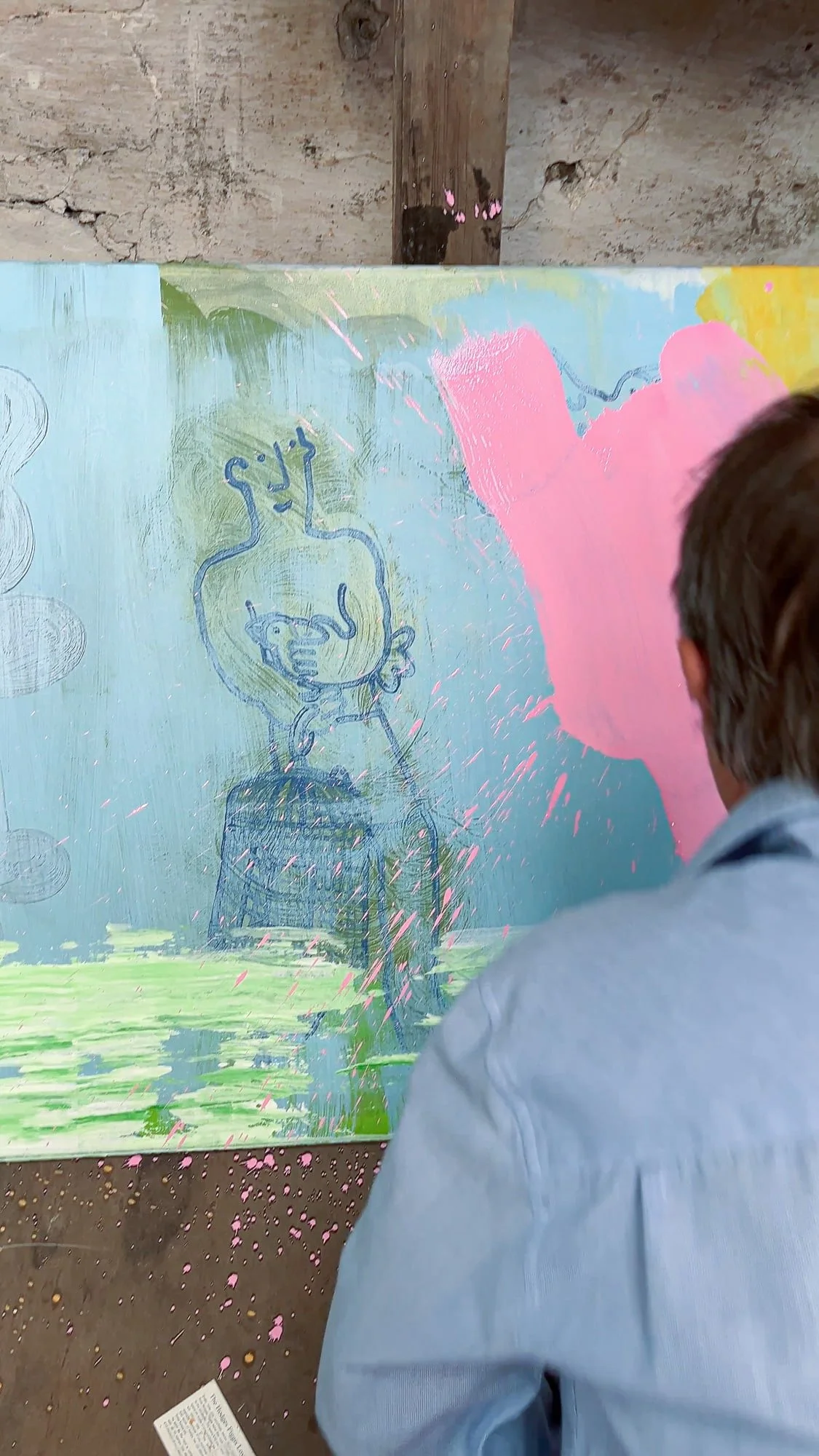 Irish artist Martin Finnin applying bold pink paint to abstract canvas in West Cork studio, figurative drawing visible beneath emerging layers, oil painting in progress