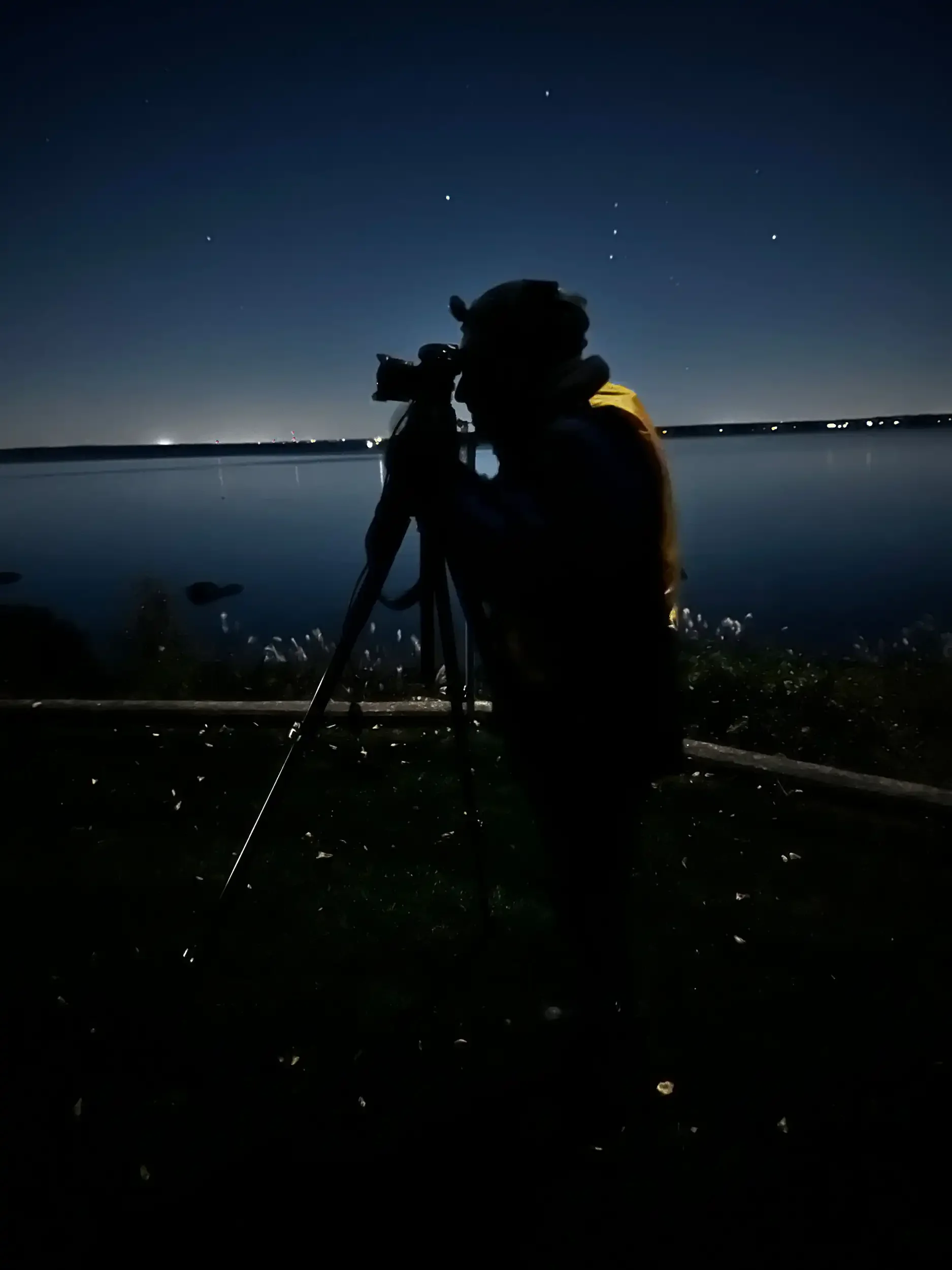 man stargazing under dark sky