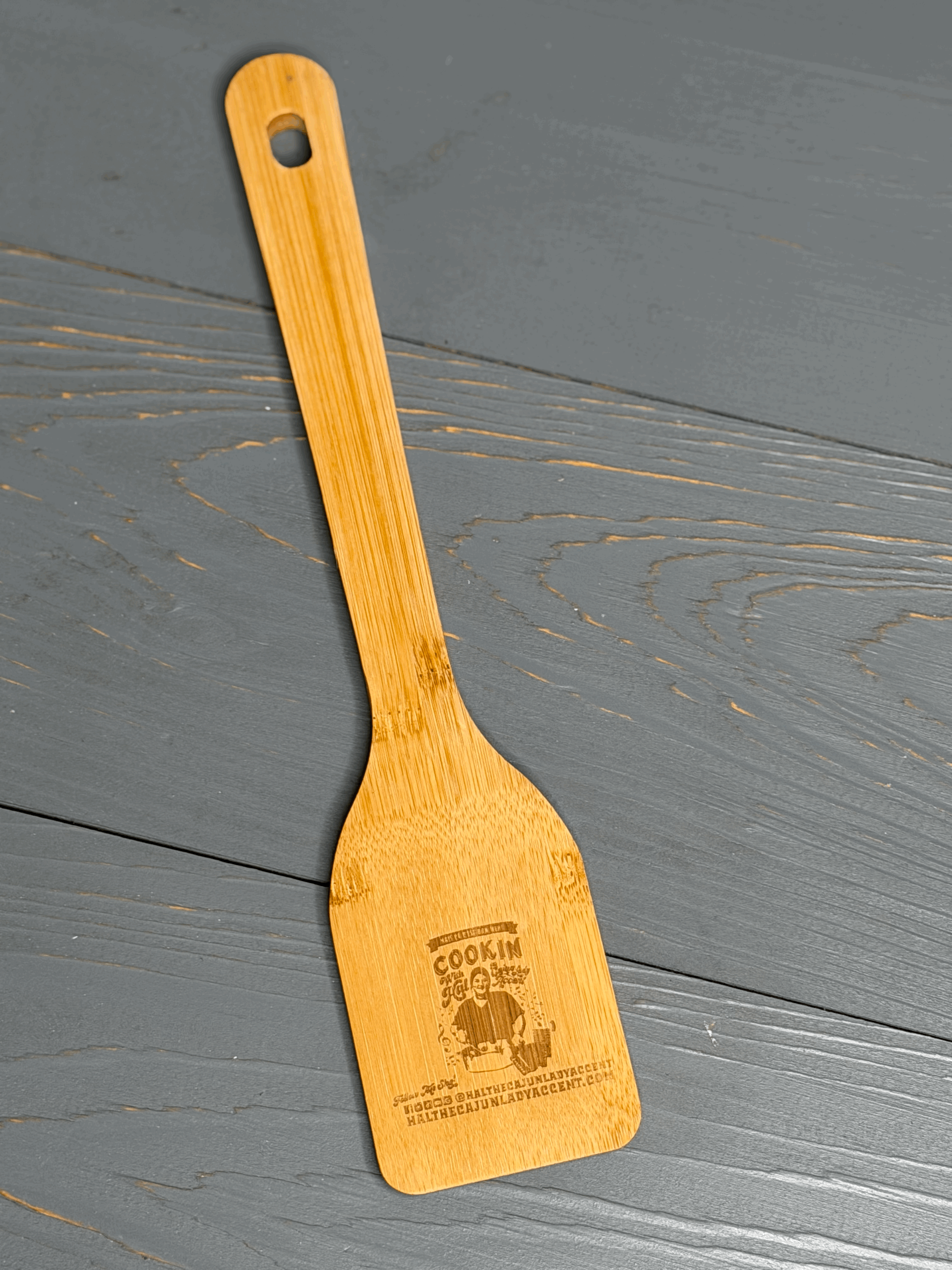 Wooden Roux Spoon Hal  Logo