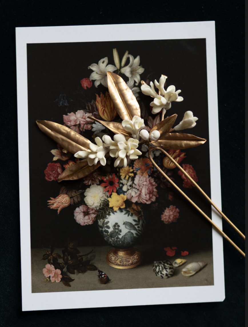 maria-sarinana-porcelain-flower-bridal-hairpins-romantic-updo.png