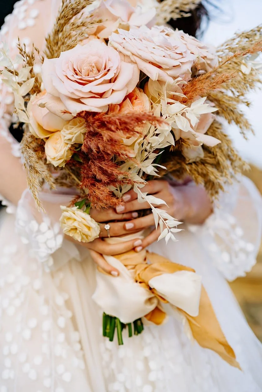 Preserved flower bouquet in soft pastels and terracota
