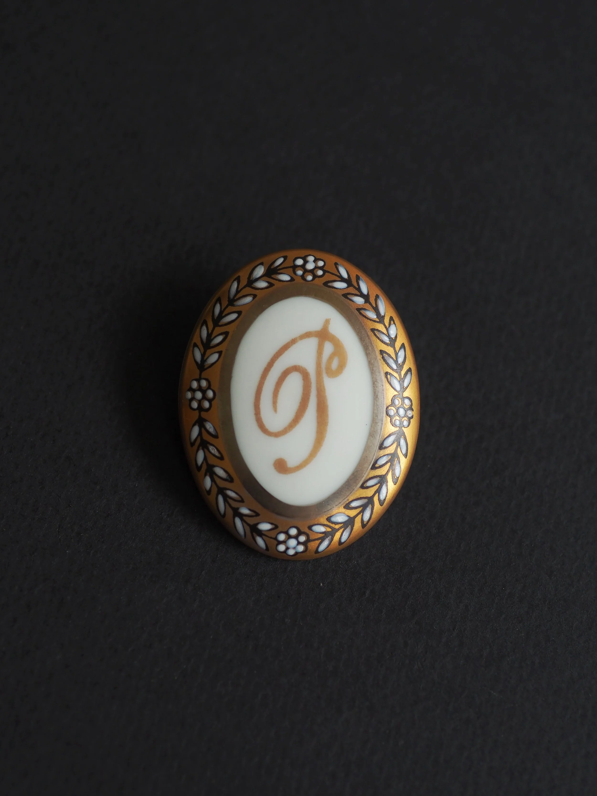 logo letter antique brooch hand made maria sarinana.jpg