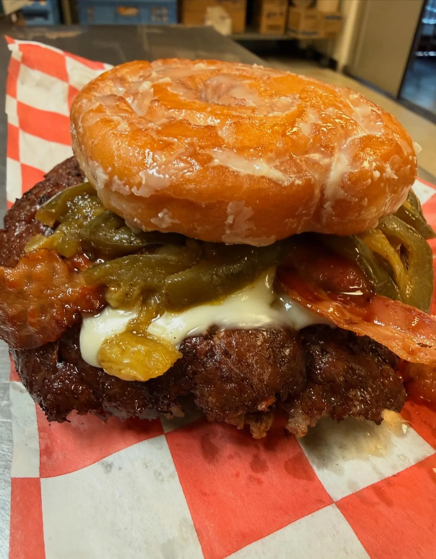 BURGER OF THE MONTH - The Princess Leia - Don&rsquo;t be fooled by those sweet buns. This one packs a punch! A burger topped with grilled onions, white American cheese, grilled jalape&ntilde;os, hot honey, bacon, served between two toasted honey buns