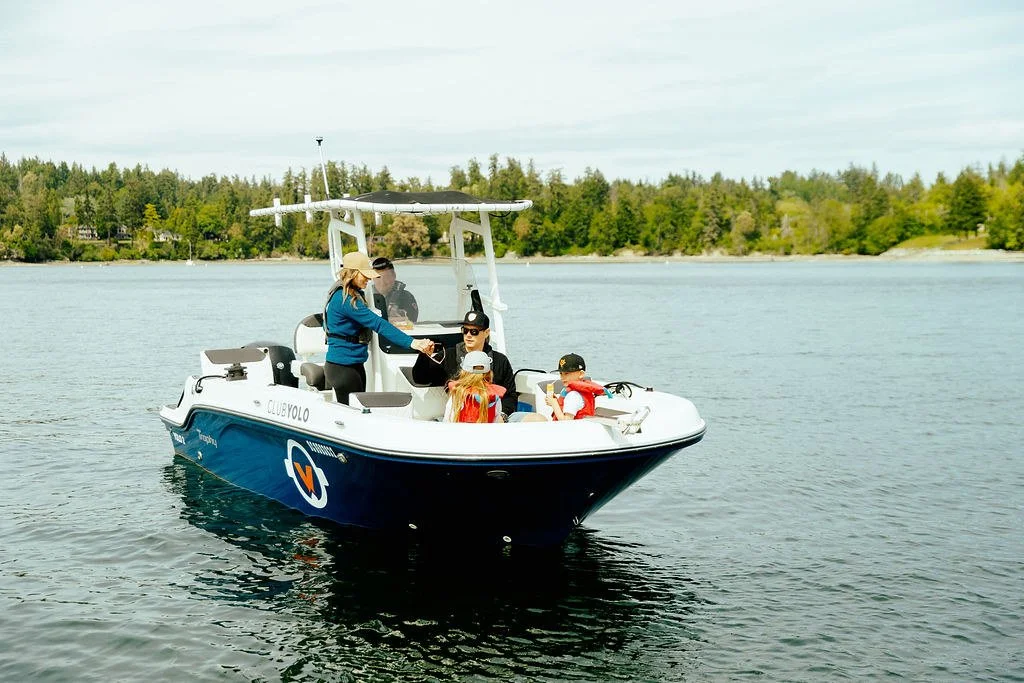 Man casting a reel while he stands on a small Trophy T20CC boat vessel