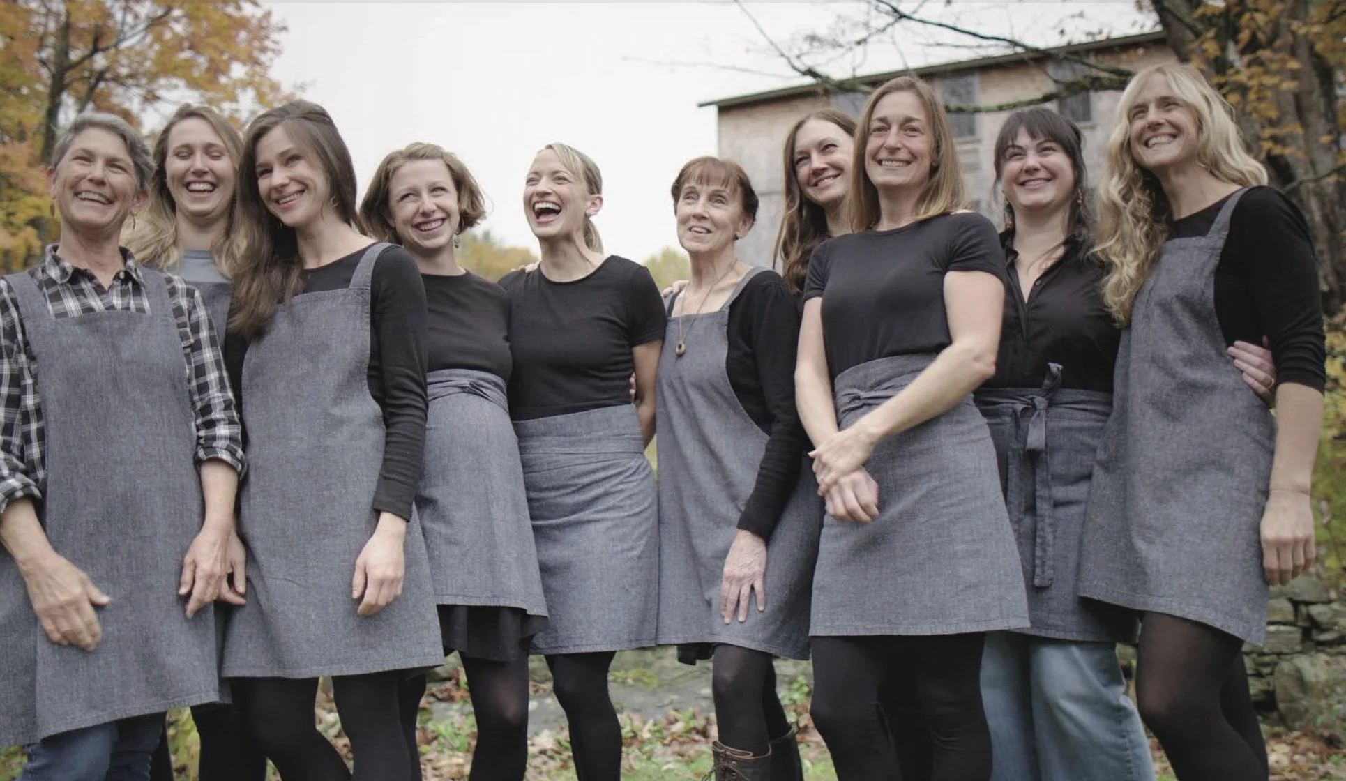 Erin, center, shares a laugh with the staff of The Lost Kitchen.