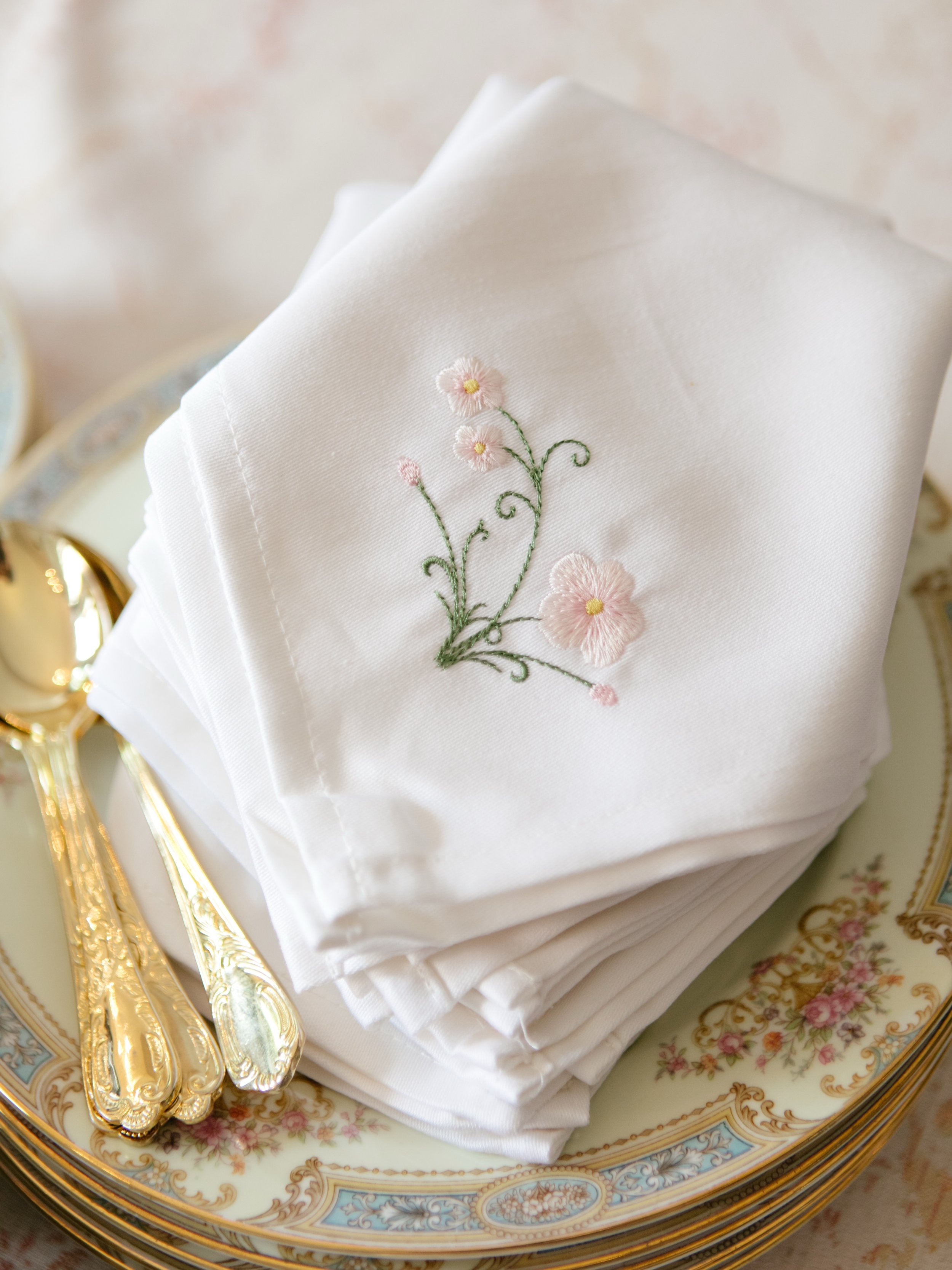 The darling details are what make a table feel thoughtful.

An embroidered napkin. Delicate china. Layered textures. Candlelight that&rsquo;s just right. These are the quiet touches that make guests feel cared for before the first course is even serv