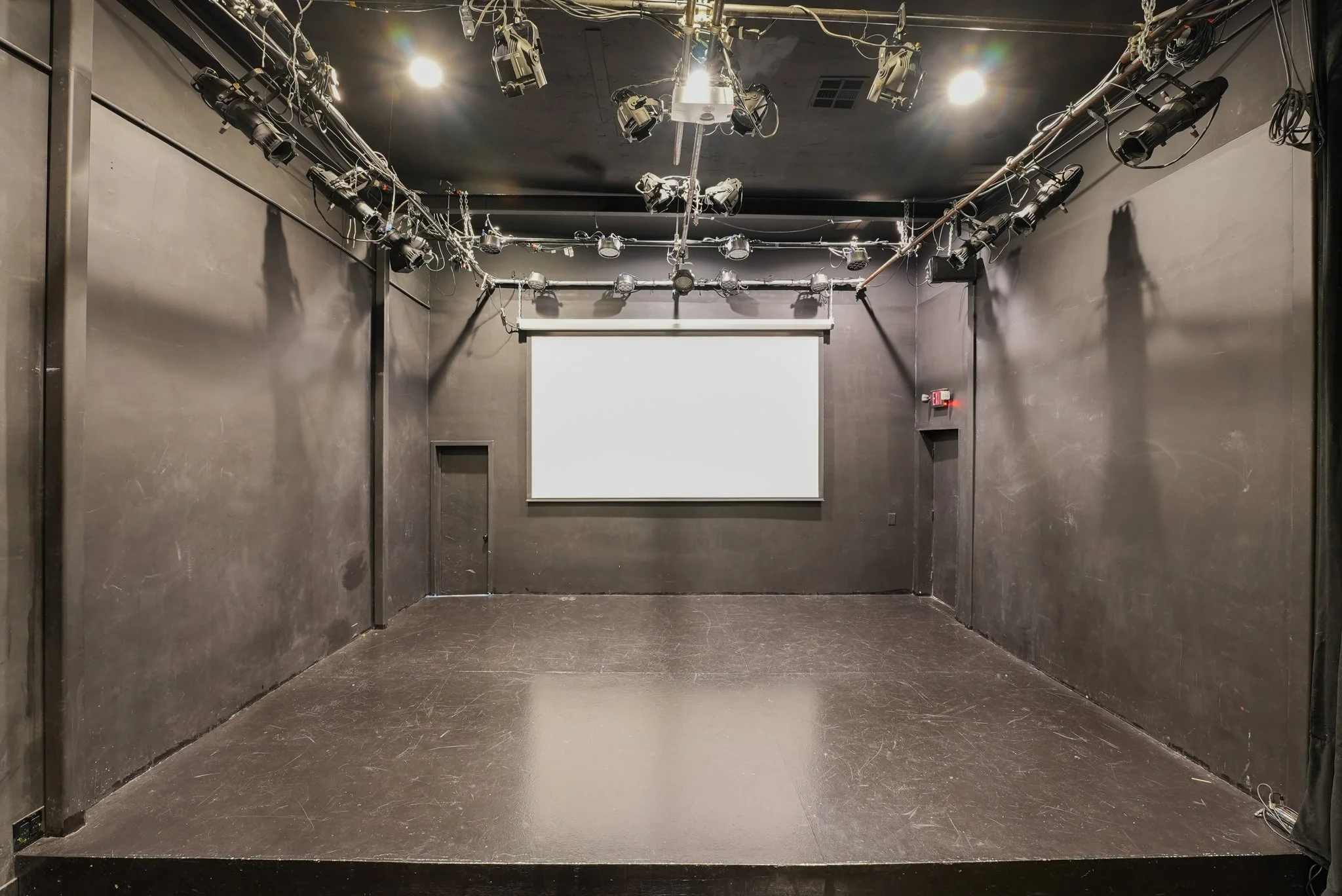 Blank Stage w/ Projector Screen