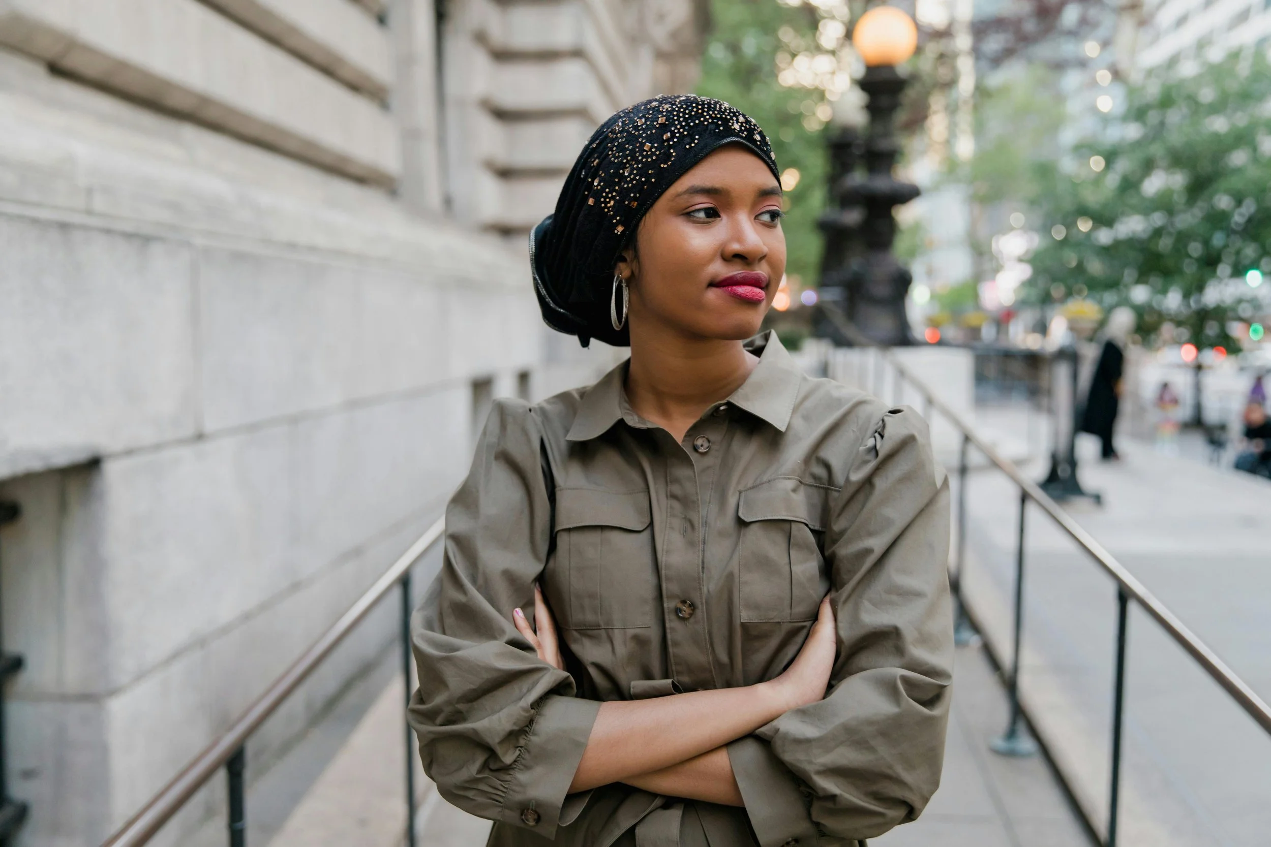 A woman standing in a pensive pose