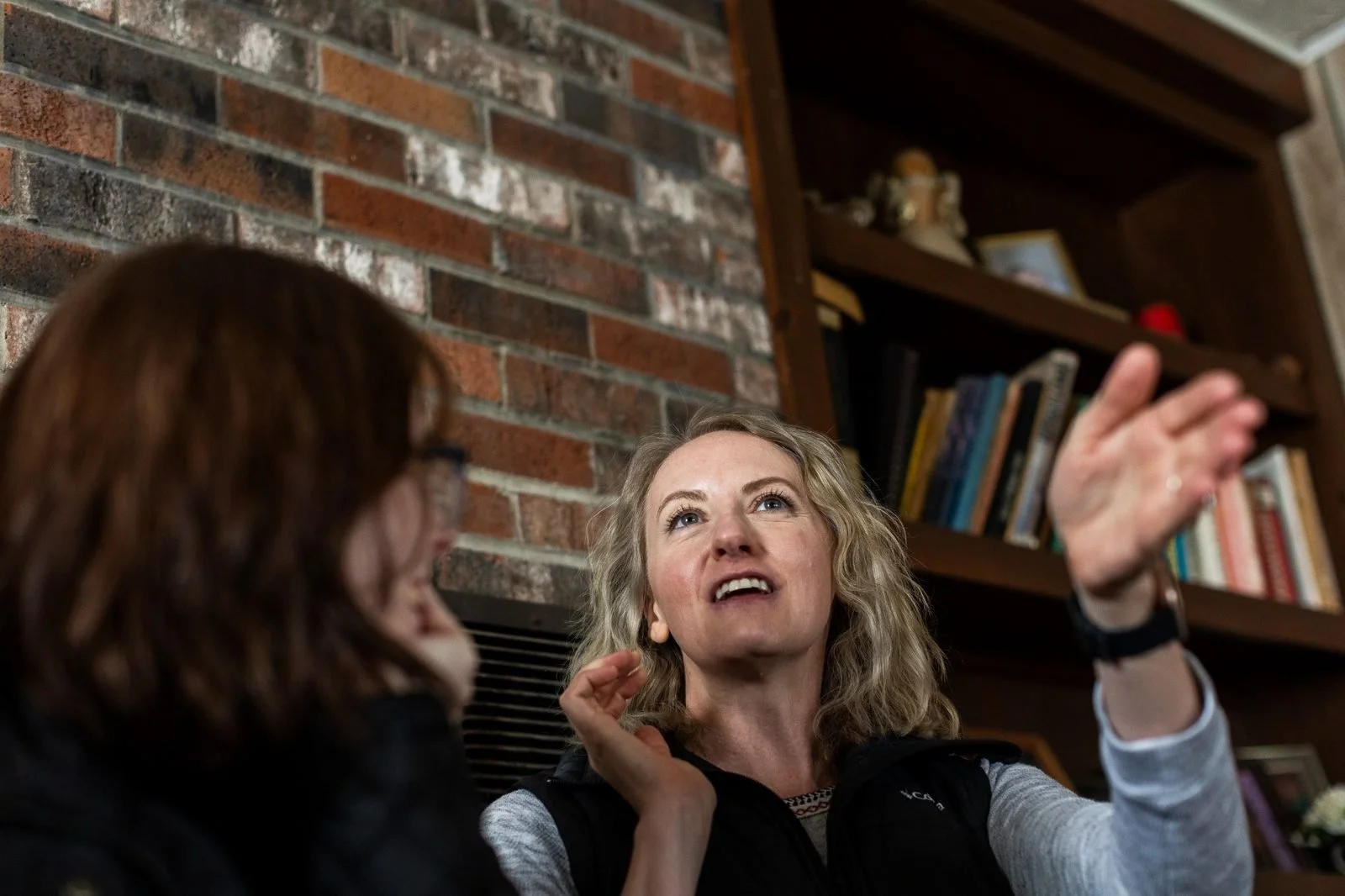 rural-missouri-family-dinner-conversation-by-bookshelf.jpg