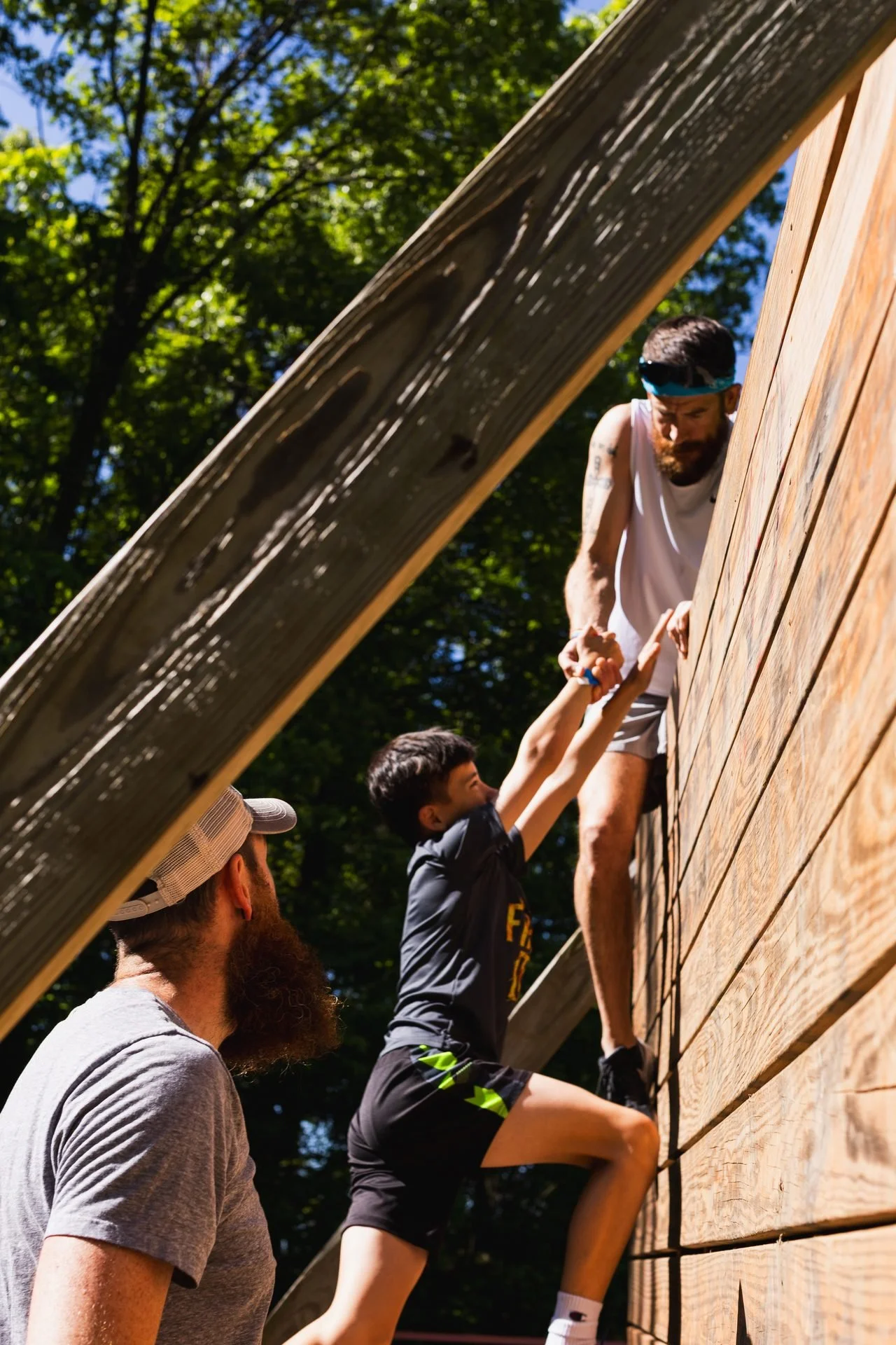 volunteers-helping-over-wall-nonprofit-event-photography.jpg