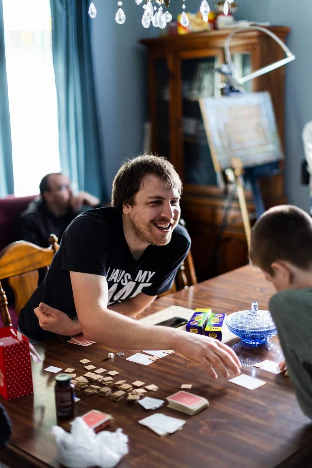 rural-missouri-family-dinner-table-game-with-child.jpg