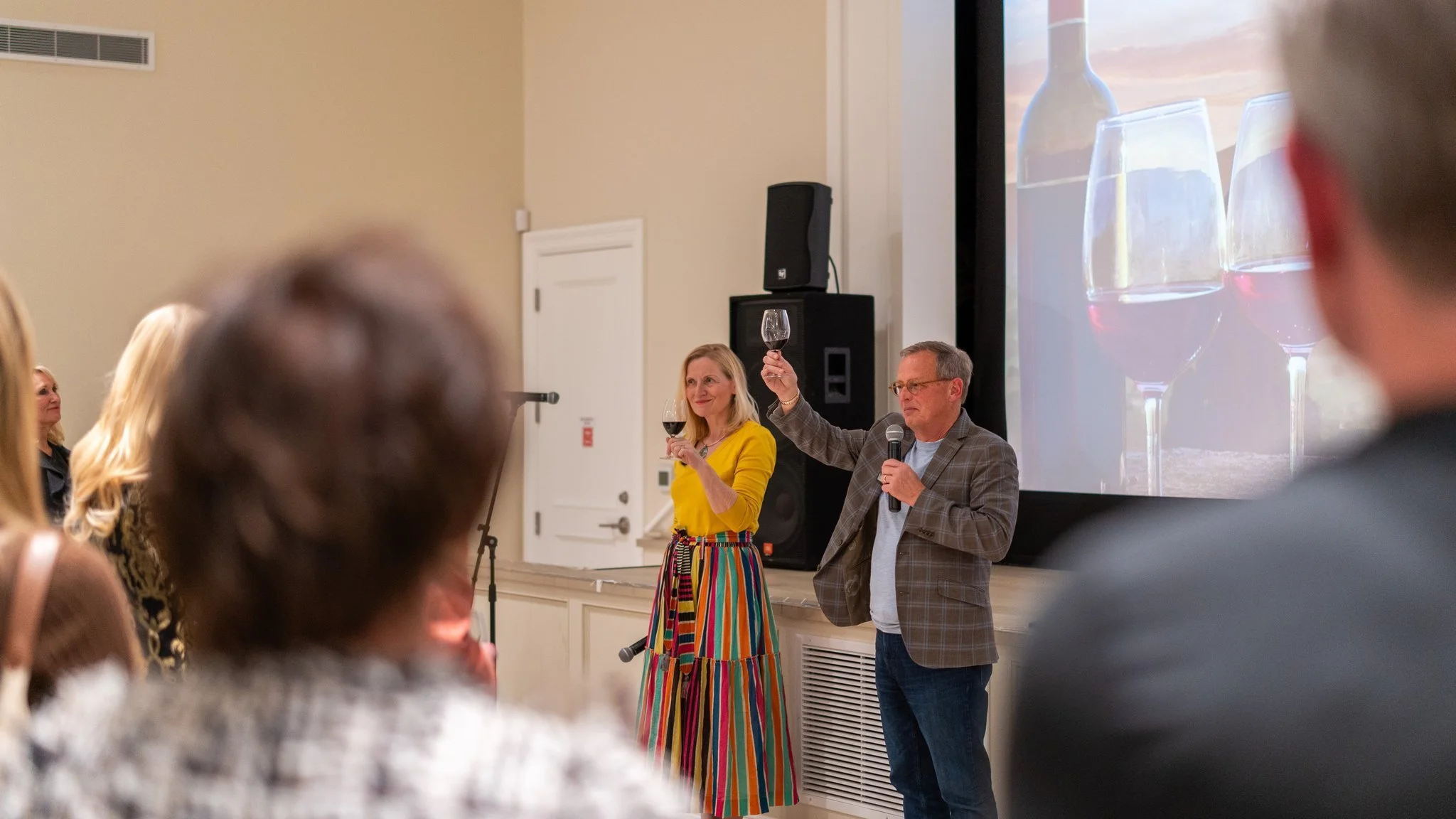 12-speakers-toasting-stage-presentation.jpg