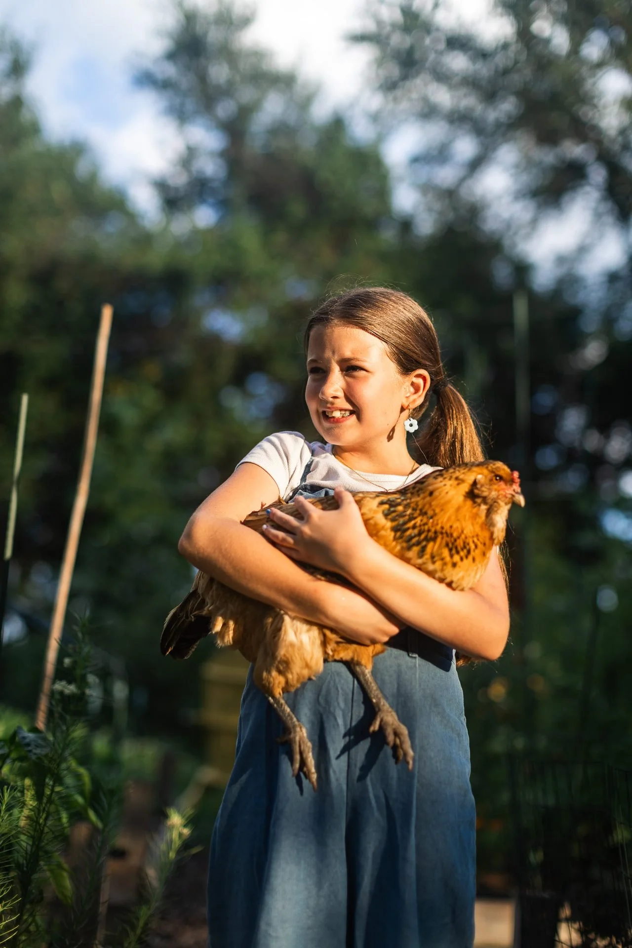 child-holding-chicken-lifestyle-brand-photography-kansas-city.jpg