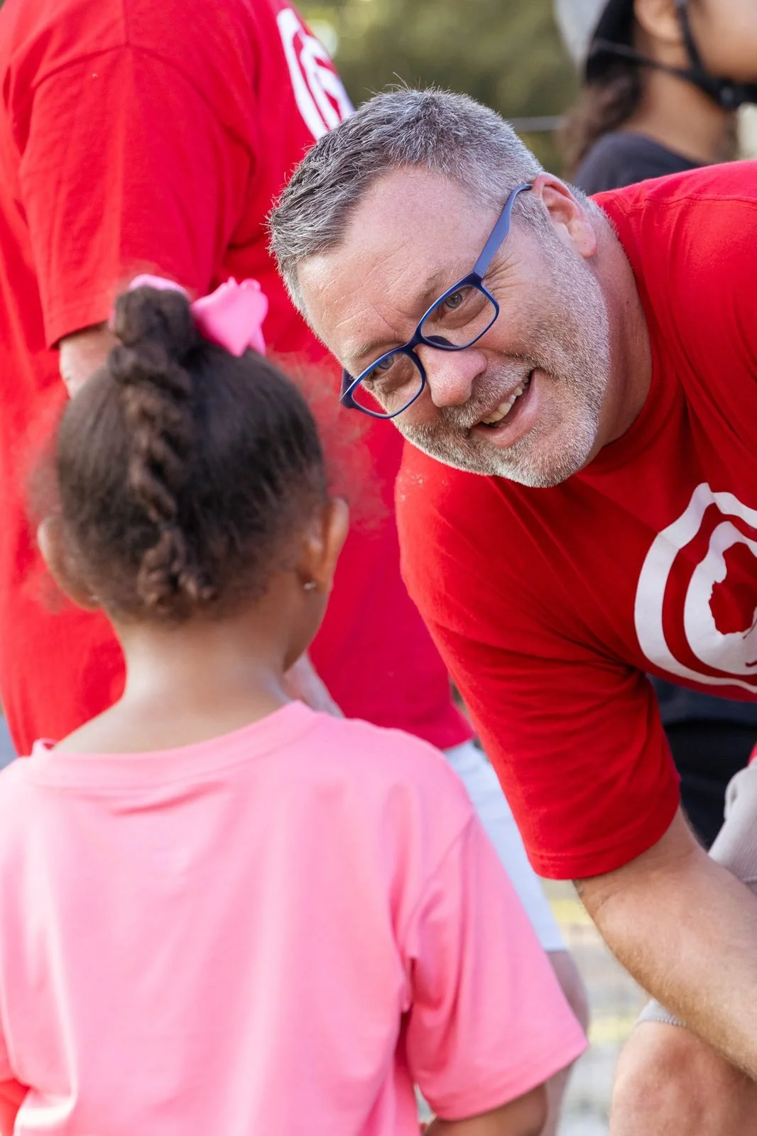 joy-meadows-second-saturday-july-2026-volunteer-talking-with-child.jpg