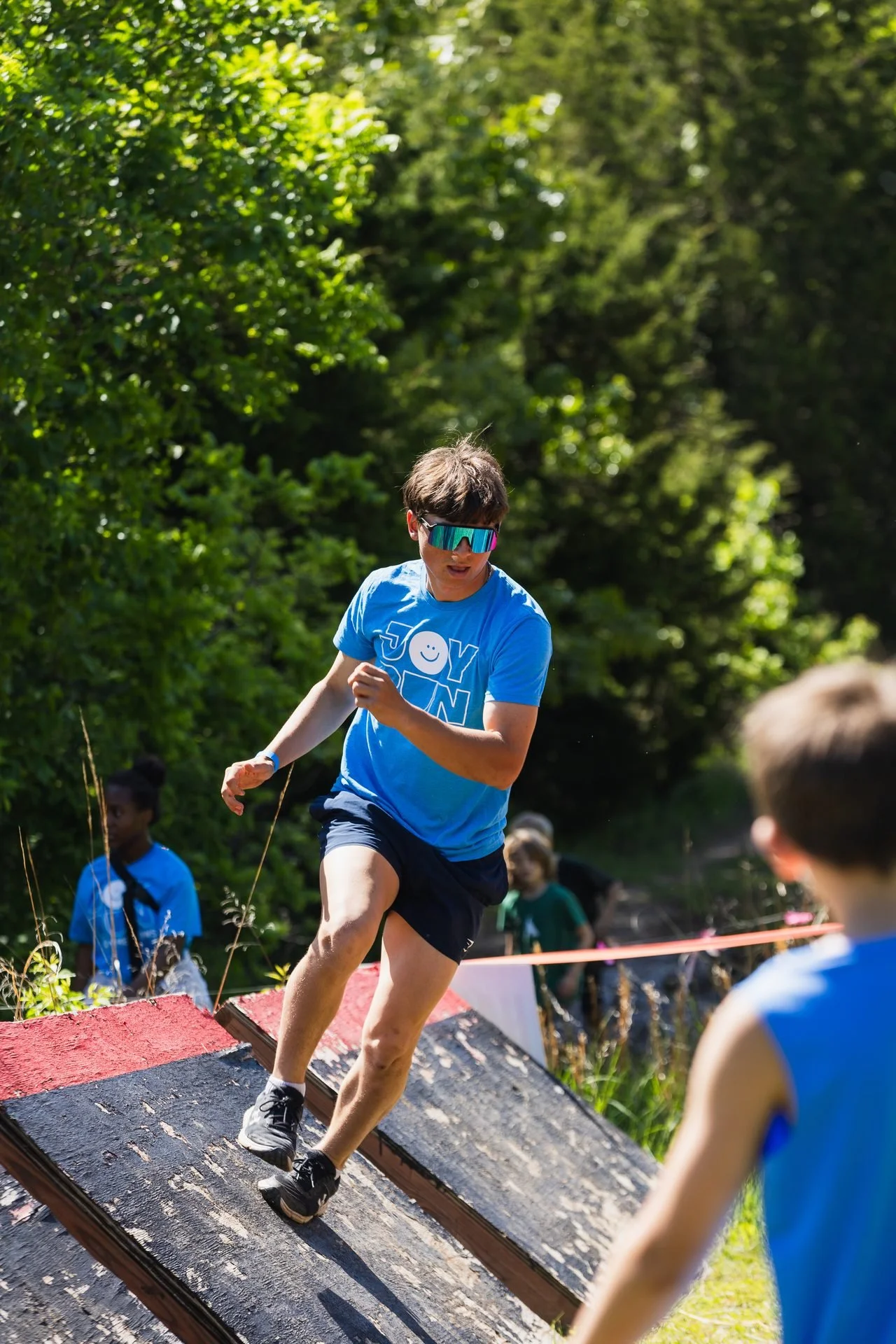 joy-run-participant-ramp-obstacle-event-photography-kansas-city-ks.jpg