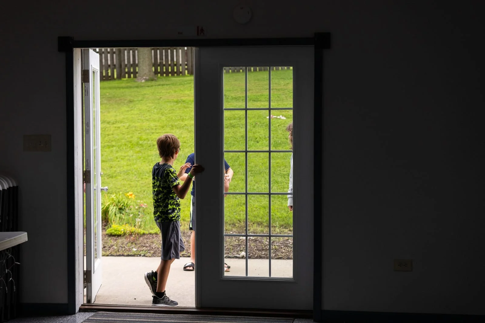 smail-family-reunion-2026-boy-open-doorway.jpg