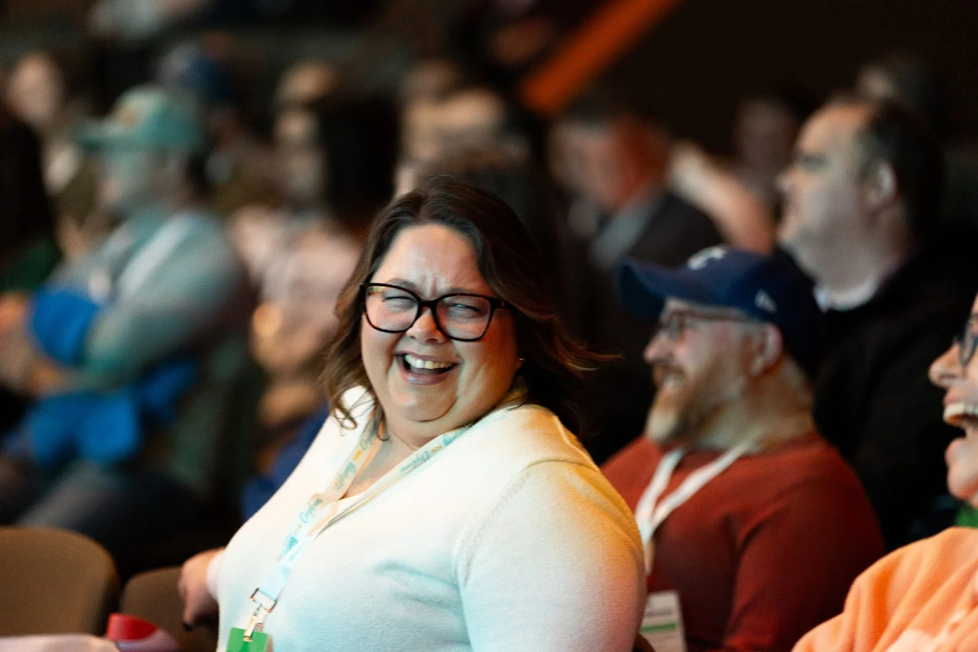 conference-attendee-laughing-candid-event-photography-01.jpg