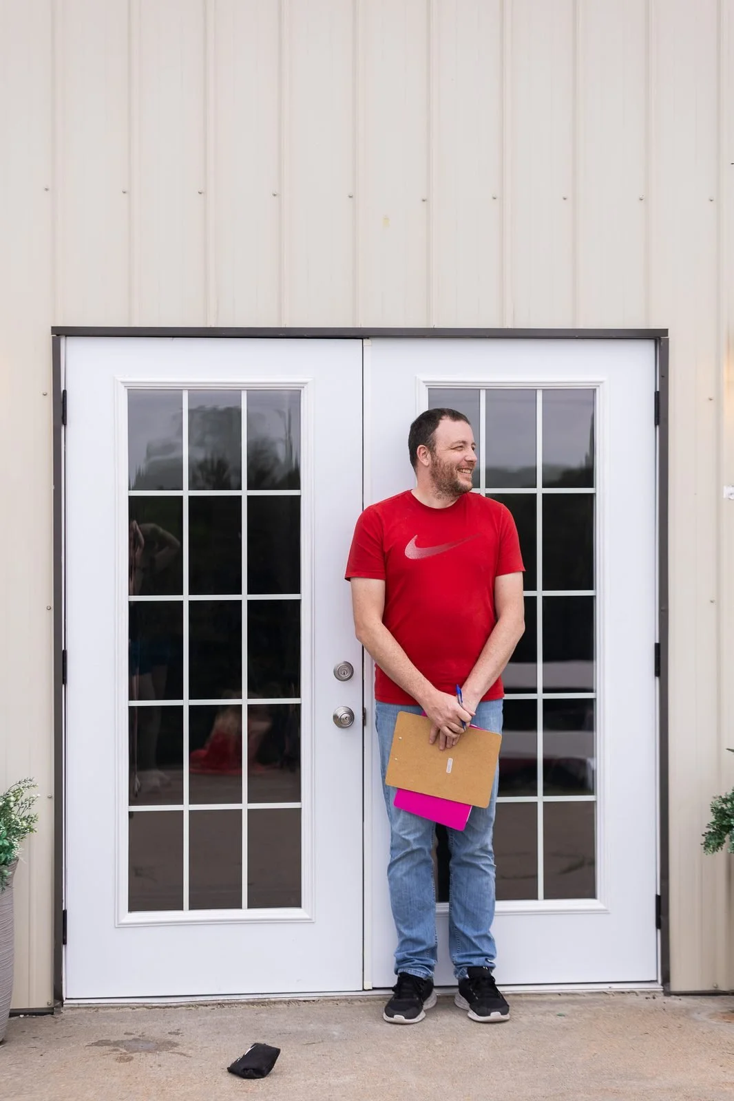 smail-family-reunion-2026-man-clipboard-entrance.jpg