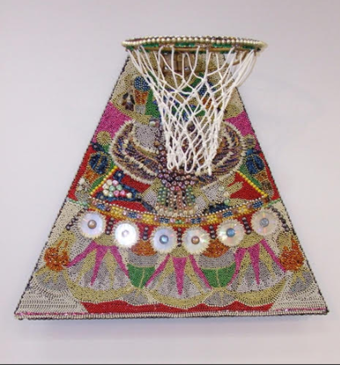 Ann Johnson. Tut’s Ice, Mixed Media: Beads, gilding, regulation goal on wood, found object chain net, 4’ x 4’ X 17” , 2004, Recently restored 2024