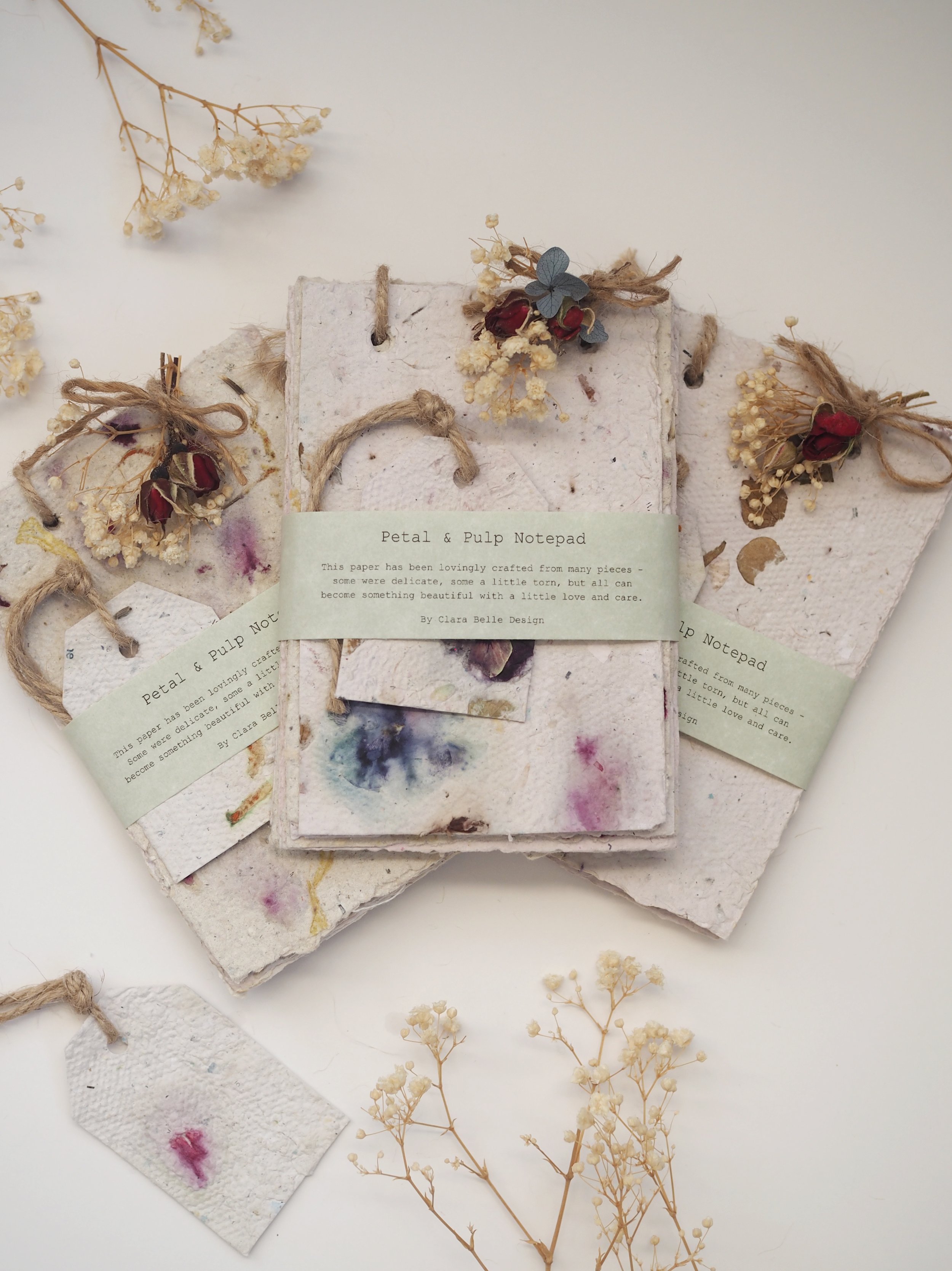 Lovingly handmade by Clara Belle Design, this notepad is a celebration of renewal and quiet beauty. Each page is crafted from rescued, repurposed paper