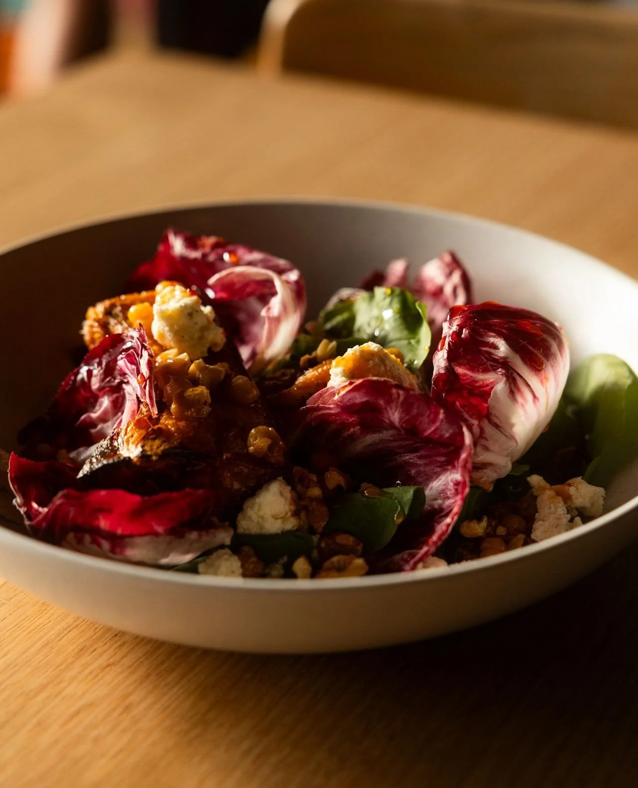 Nothing says Autumn quite like pumpkin 🍂⁠
⁠
Our new Roasted Pumpkin Salad brings it all together - caramelised roast pumpkin layered with wattleseed tannin cream, bitter leaves, toasted walnuts and chickpeas, finished with lemon myrtle ricotta and a