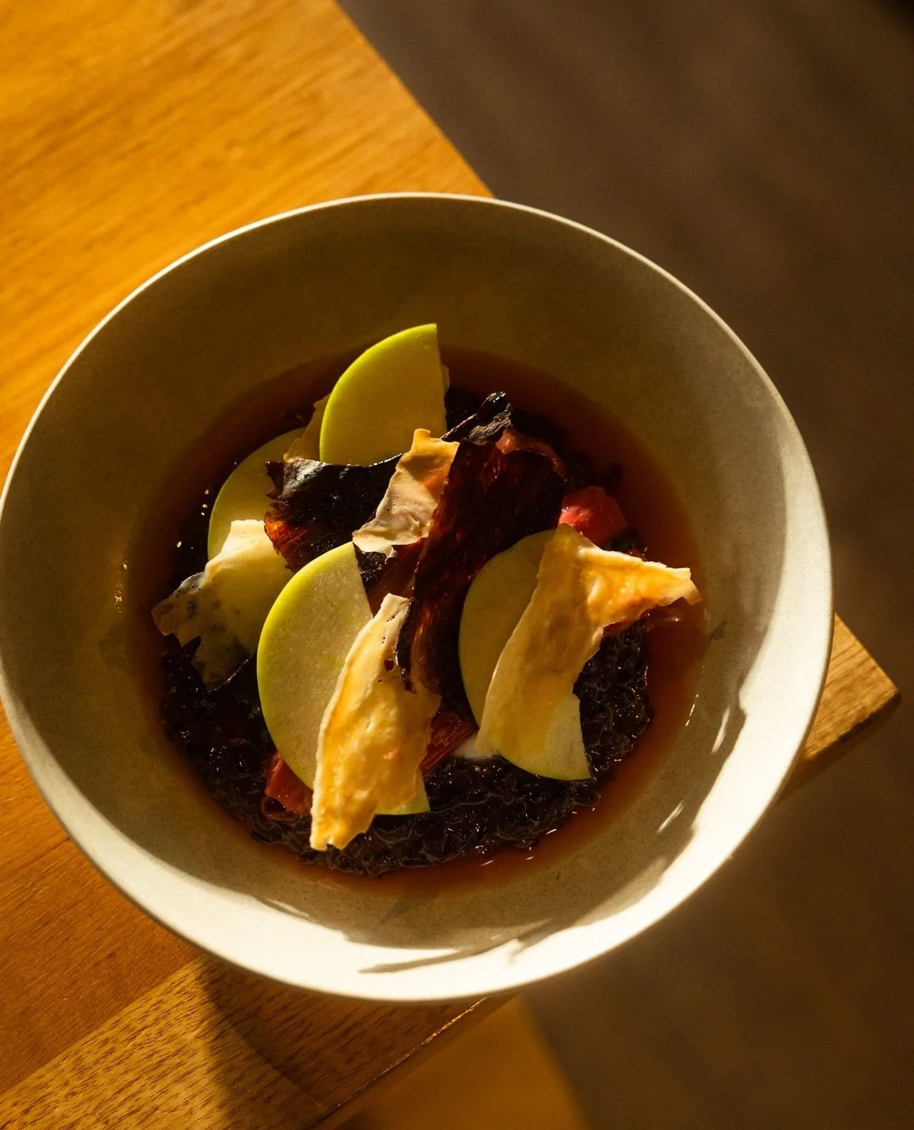 Introducing our Rhubarb Black Rice Pudding 🥥⁠
⁠
Black sticky rice with poached rhubarb, strawberry gum syrup, coconut yoghurt, fresh apple and coconut crisp.⁠
⁠
A naturally sweet breakfast that feels indulgent, without the guilt <3⁠