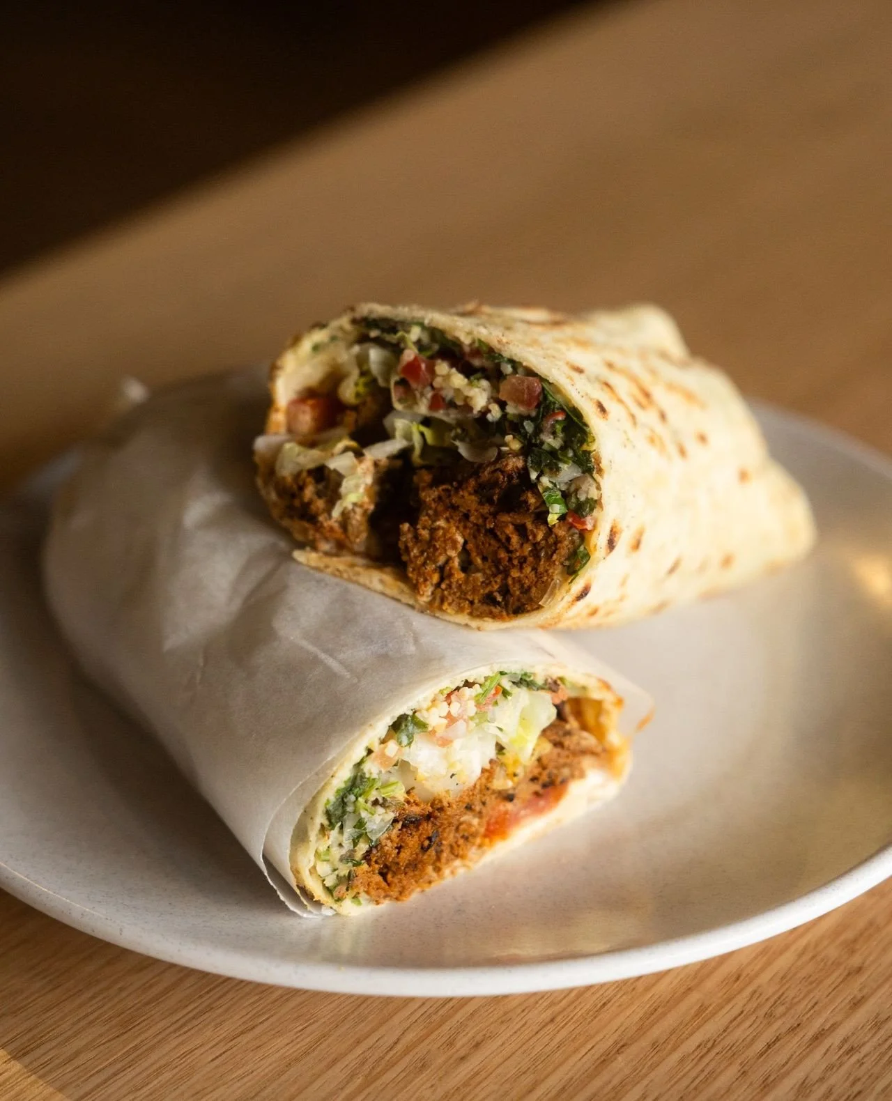 IT&rsquo;S THE LAST WEEK OF OUR LAMB DONER KEBAB SPECIAL! ⁠
⁠
House-made flatbread filled with pepperberry lamb, tabouli, wattleseed hummus, garlic tahini, onion and tomato, finished with a punch of fermented hot sauce.⁠
⁠
Don&rsquo;t miss your chanc