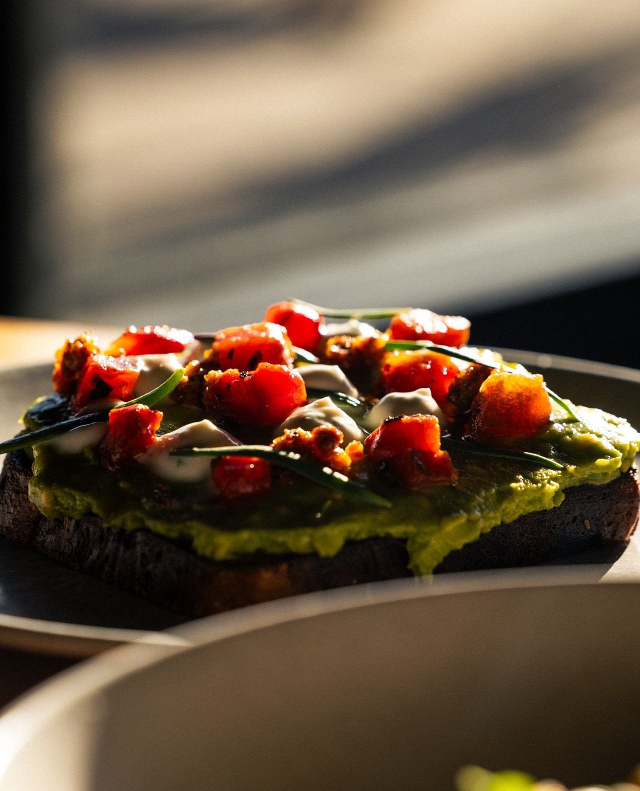 Kirribilli&rsquo;s favourite avo on rye 🥑⁠
⁠
Smashed avocado, grilled watermelon, coconut cream and macadamia salsa brava on dark rye sourdough, finished with bright pops of finger lime.⁠
Add a poached egg, add bacon - it&rsquo;s the perfect vessel 