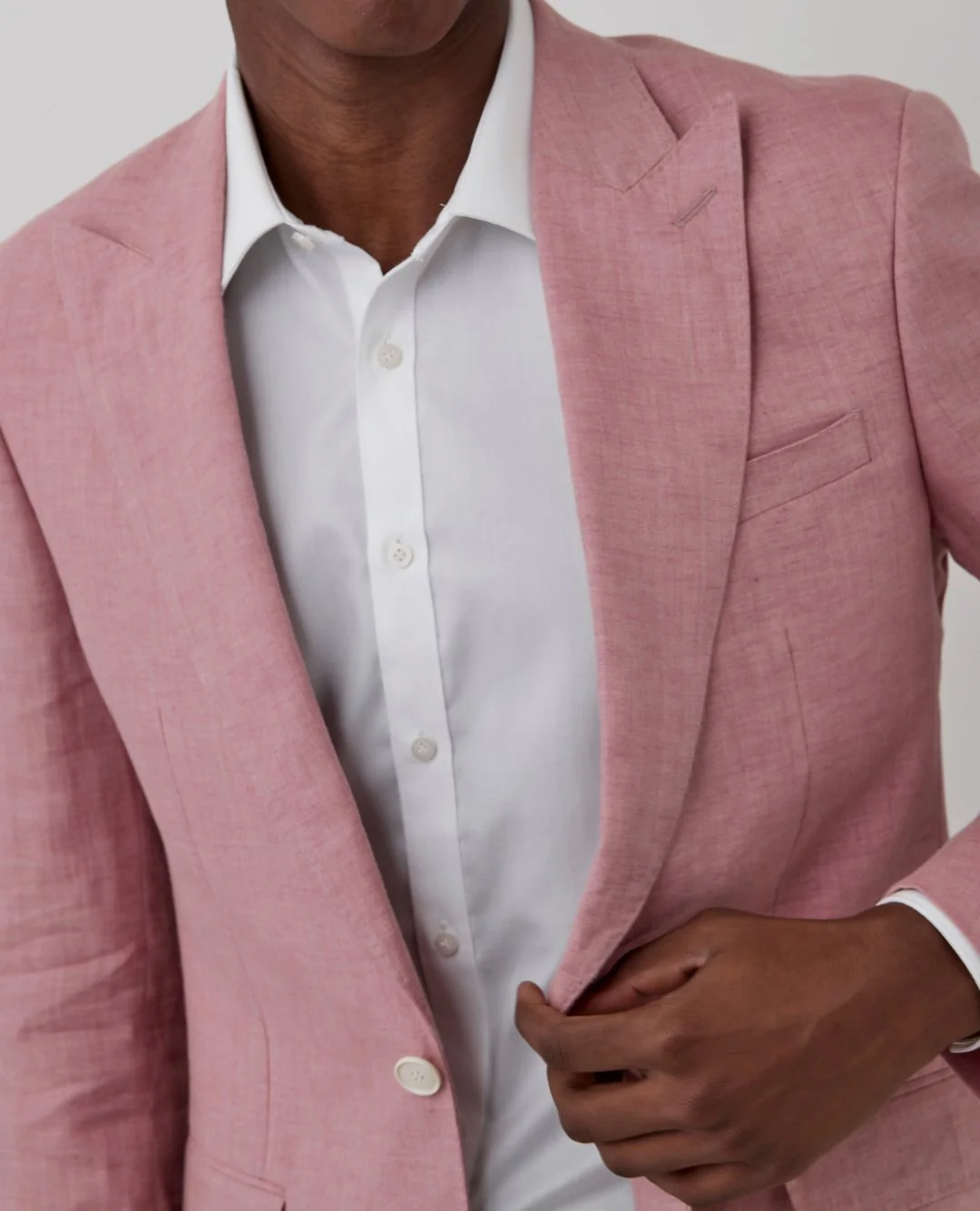 In the details. Crafted from smooth linen with a soft pink hue that complements a neutral look, reach for the Vedder sports jacket for smart casual dress codes. ⁠
⁠
Shop online or at David Jones. Link in bio.