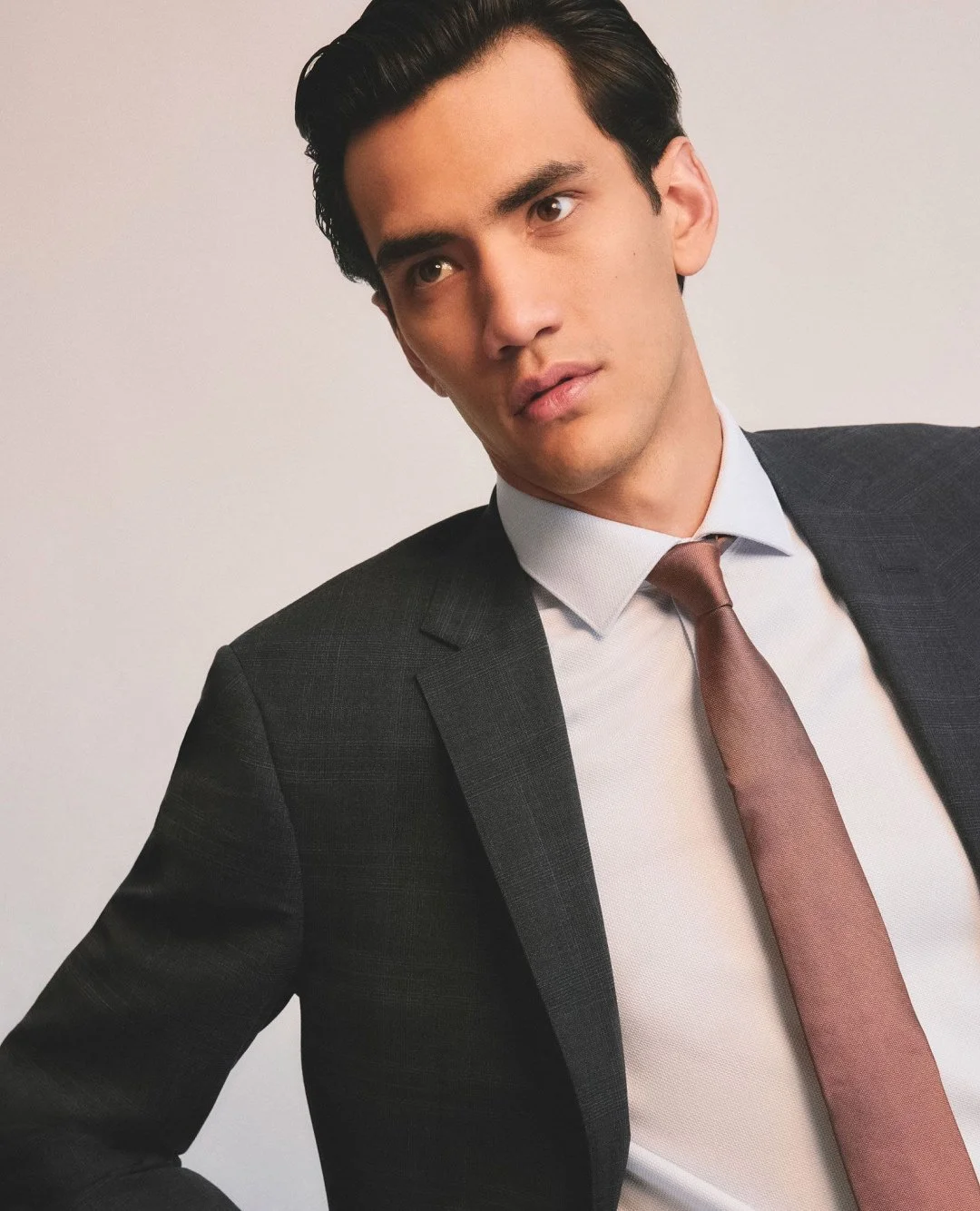 A suit that means business, you can't go wrong with textured check.