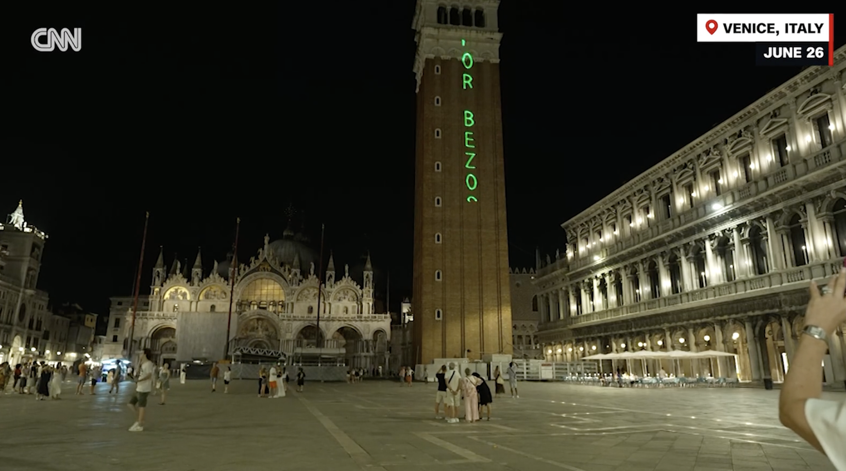 ‘No space for Bezos’ projected with laser on Venice building