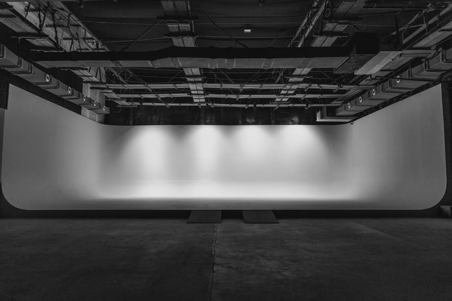 White cyclorama studio in Delhi NCR with RGB and turntable — Cellar Door Studio Three