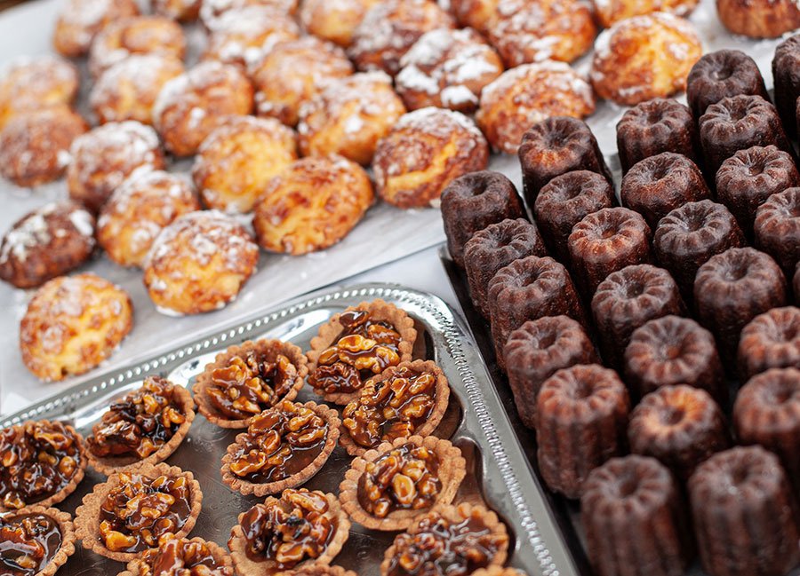 Assorted croissants, danishes, and pastries on display in a bakery, capturing the flaky richness of Melbourne’s pastry scene.