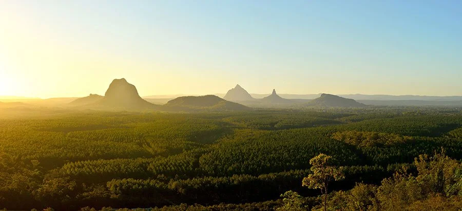 Panoramic winter sunset over the Glass House Mountains – a scenic backdrop to Maleny and Montville getaways in the Sunshine Coast Hinterland
